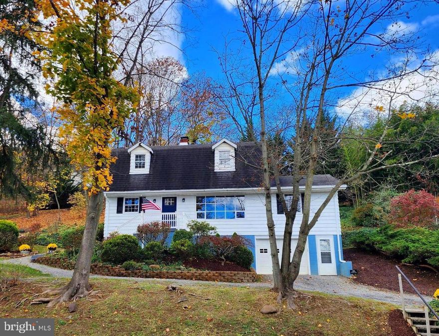 Charming and fully refreshed Craftsman Style Home, nestled just outside of historic Cumberland in Mountain Side Maryland, this stunning 3 bedroom, 2 full bathroom home is a perfect blend of comfort and style, recently updated throughout, includes a modern hickory kitchen with granite tops (2012),  both bathrooms updated (2024), new laminate flooring throughout, included vaulted ceilings, freshly painted throughout, new doors and hardware, flooded with natural light, the open layout creates a warm and inviting atmosphere. Spacious Owner's Suite on Main Floor: Enjoy convenience and privacy with generously sized  bedrooms. Walls of windows enhance the serene mountain views and tranquil surroundings, peaceful outdoor patio, perfect for summer barbecues, basement provides extra additional storage options. Located just minutes from local schools, shopping, and parks, this home offers both tranquility and practical flow. Don’t miss the chance to make this beautifully updated home your own!