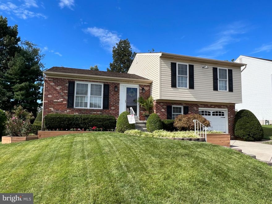 Check out this beautifully updated 4 level Split 3 Bedrooms 2 Baths, 1 Car Garage. Landscaped yard with a Large private back yard that backs to woods with an underground Sprinkler System.  Living Room, dining room and Kitchen on main level, Master suite plus 2 Bedrooms up. Laundry and full bath on same level with door to and from the garage. lowest level is the Large open Family Room, workout room, bar and office space. Central Vac system, Intercom system, Decks off the Dining room and the Master Bedroom. Go through sliders off the owners suite to PRIVATE Deck w/ Covered Hot Tub,  perfect to relax in after that tough day at work!  Convenient neighborhood, close to everything! The pictures say more than these words! Don't miss this one!