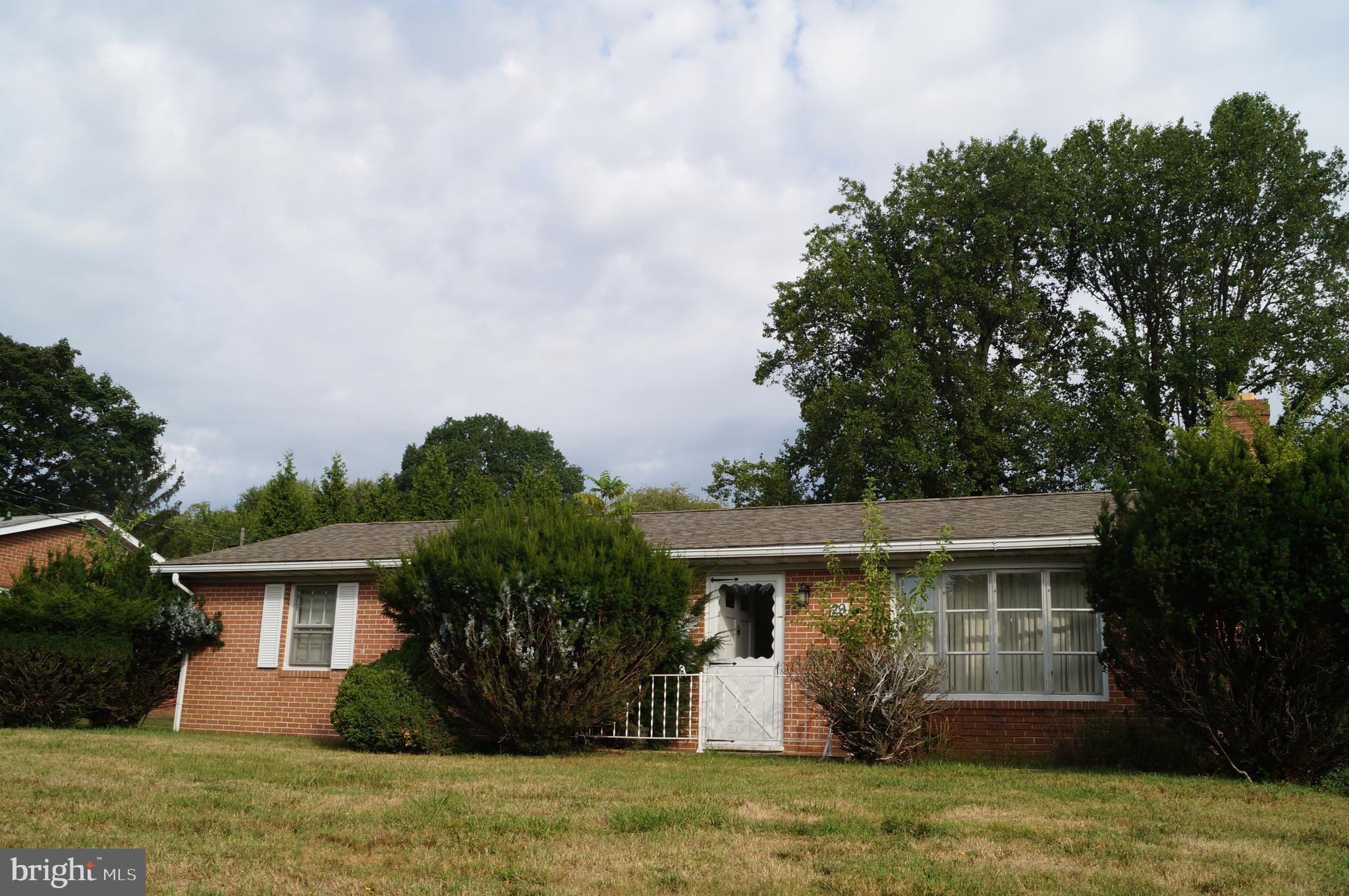 All brick ranch style home with front porch and rear covered porch and lard backyard with storage shed. 3 bedrooms 1 bath with hardwood floors throughout. New hot water heater, roof and heat pump and central AC. Large unfinished basement. Washer and Dryer included. No pets, no smoking. The fireplace is nonfunctioning. Comcast Internet available. Views of the Harpers Ferry Gap. The River Access is through River Riders on Rt. 340 - it is public - you pay a fee for using the River. No pets, no smoking.