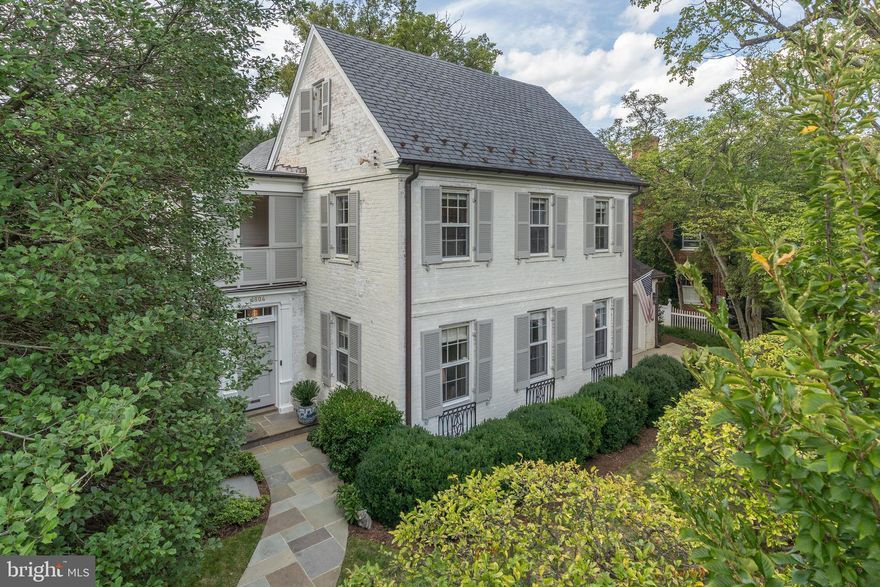 Ideally located in Colony Hill, a private enclave off of Foxhall Road, this exceptionally charming property has garnered admiration over the years and has recently undergone a remarkable transformation by the skilled craftsmen at Barnes & Zantzinger. Distinguished features of this home include covered porches on two levels, a gourmet kitchen addition, updated exercise room and a two-car garage.

The white-washed brick exterior, louvered doors, and inviting porches evoke a Charleston-inspired aesthetic. Boasting 5 BD/4.5BA  and nearly 4,500 square feet of stunning interior living space. Exterior features include a maintenance-free astro-turf lawn with mature landscaping, providing the yard ample privacy, and a putting green. Offers if any due Tues Sept 26th 10:00am.