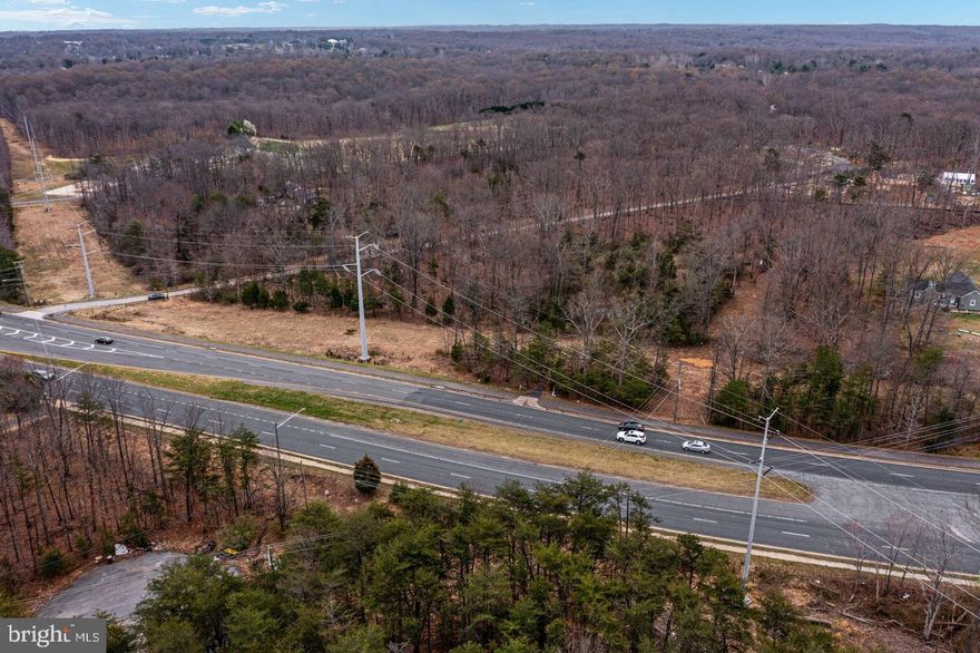 Commercial Land for Sale in desirable Fairfax County! Lot on 6.36 Acres located at the corner of Mendell Street and Braddock Road.   Zoned R-1(RC).  Future expansion of George Mason University is planned diagonally right across Braddock Road.  Commercial Property could be built zoning restrictions apply make sure to view zoning documents in listing.   Shirley Gate Extension road passes through the North Western portion of the property, therefore this parcel becomes the corner lot of the two main roads. Shirley Gate Extension connects Braddock Road and Fairfax County Parkway. Shirley Gate Extension is approved and in the construction stage to be completed in 2028. Electricity is available within the property. The possibilities are endless!