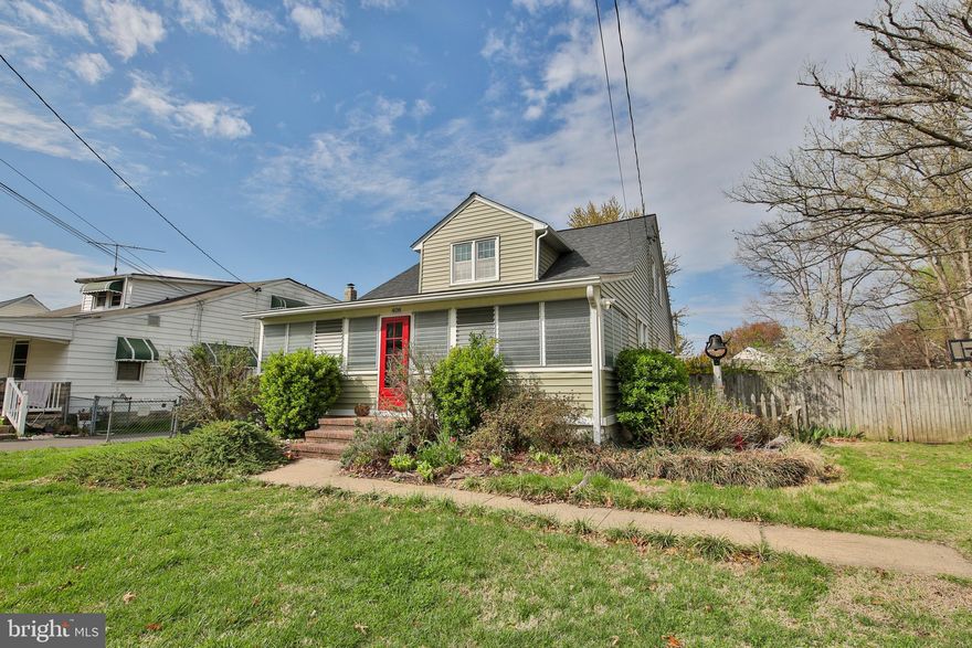 Great large cape cod on oversize lot in Linthicum Heights.  A home with true character, from the amazing front porch with exposed wood  ceiling, to hardwood floors, and custom touches throughout.  Large living room  with pellet stove, and hardwoods leads to kitchen and dining room. Two bedrooms and a full bath complete the first level. The second level has an additional full bath, and a versatile floor plan that can be a large primary suite with nursery or sitting room, or can be used as two smaller bedrooms with large open space.  The finished lower level features an open ceiling, and amazing woodwork throughout, and  a powder room. The laundry area is there as well, and features a new washer and dryer. The large fenced yard features multiple living areas including uncovered and covered living spaces, and three storage sheds. There is a large driveway, and also a carport for two cars.  New architectural shingle roof in 2025. This is a must see, not your cookie cutter renovation here! Contingent on seller finding home of choice.