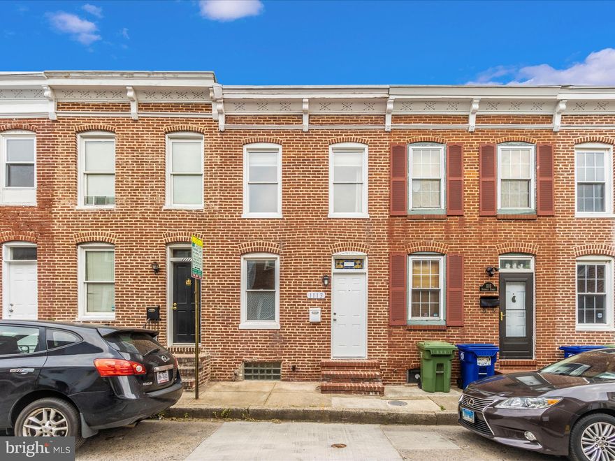 Location!  Location! Walk to Ravens and Orioles games.  This 2 bedroom 1.5 bath home has been redone in 2019-2020.  New gourmet white kitchen with stainless steel appliances, granite and island.  A new half bath was added to the main level, a livingroom with brick wall and easy care laminate flooring finish up the Main Level.  Upstairs two bedrooms one with new carpet in 2019 and hardwood floors in other and an updated full bath in 2019. Back patio may be opened up possibly for a parking pad.