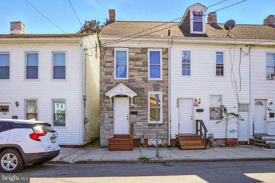 Move right in or add this beauty to your portfolio!  Lots of space to spread out in this home.  Although technically a 3 bedroom, there are 2 additional rooms that could easily serve as bedrooms .  The living room, dining room and kitchen have all been updated.  The 2nd floor was also updated with LVP flooring.  There is a newly constructed balcony off of the rear bedroom and the carpeting on the 3rd level is in good condition.   High ceilings and off street parking are some additional perks.