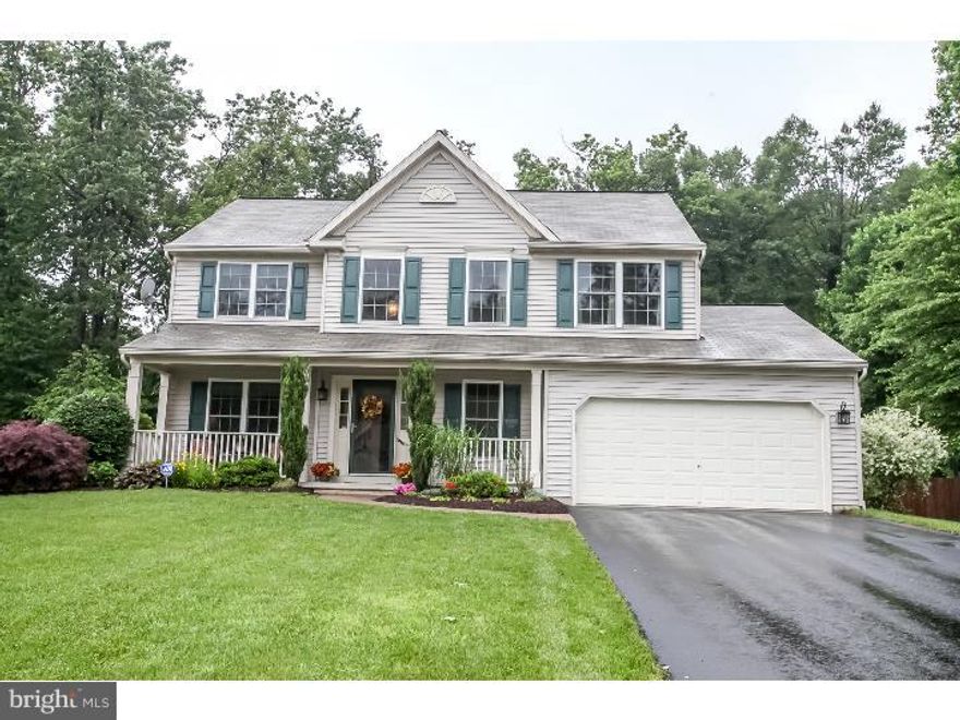 LAST OFFER BEFORE SELLER HAS TO TAKE HOME OFF THE MARKET - it's not a short sale, it's just a VERY MOTIVATED SELLER. The seller is offering $4,000 to a buyer who brings an acceptable agreement of sale by Dec. 12 AND $1,000 to the agent who represents the buyer.   HOME is where the HEART is and this house has just that and a whole lot more both on the inside and out. Sitting on more than .5 acres, this home has beautiful curb appeal and is completed with a private, fenced in backyard with a fantastic patio perfect for quiet evenings, relaxing mornings and entertaining. When not outside, the interior of this home is warm and inviting. Enter into your bright, open foyer with a formal sitting area immediately to your left or walk right into your high end kitchen and family room. The kitchen fancies Corian countertops, new appliances, and a large eat in area. The formal dining room is just off the kitchen. The second floor features four bedrooms, a hall bath and large master suite with private master bath AND a jacuzzi tub! This home is completed with a huge, finished basement perfect for those looking for a "man cave!" and additional living space. There is an over sized storage area in the basement as well. Still need more space? There is a large two car garage with storage space! This is a place to hang your heart; beautiful home in a beautiful setting.