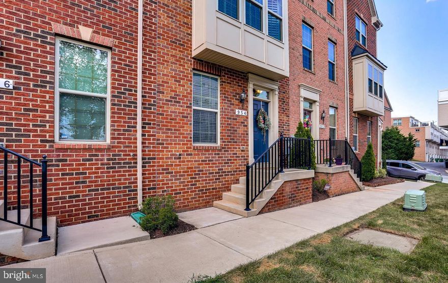Meticulously maintained 2 Bed | 2.5 Bath | 2 Car parking townhome in O'Donnell Square! The lower-level entrance opens to a versatile space, ideal for an office, mudroom, playroom, or den, complete with a convenient half bath. The main level exudes charm with a spacious living room featuring stunning hardwood floors, high ceilings, a bay window bump-out, and custom plantation shutters. The kitchen is a chef's dream, boasting beautiful granite countertops, an oversized island, ample cabinet space, a pantry, and stainless steel appliances. Step outside to one of O'Donnell Square's largest decks, perfect for entertaining or unwinding. Upstairs, discover a primary suite with a double Roman marble shower, alongside an additional bedroom and hallway full bath. Enjoy the convenience of a one-car garage and a one-car parking pad, offering two personal parking spaces. Conveniently located to the shops at Canton Crossing, classic Greektown restaurants, Yard 56, Bayview Hospital, and major roadways.