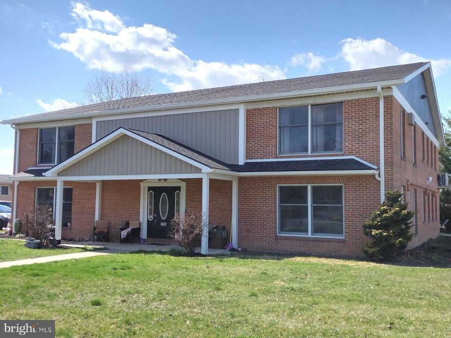 UPDATED spacious second floor 2-bedroom 1 large full bath apartment! This is a NO Pet and NO Inside Smoking unit. Once you step inside, this apartment offers large open living/dining area open thru to the kitchen which is equipped with stove, refrigerator & dishwasher. Also features totally remodeled bath, new paint and flooring throughout, and a laundry room with washer & dryer hook-up! Unit comes with two off street parking spaces.