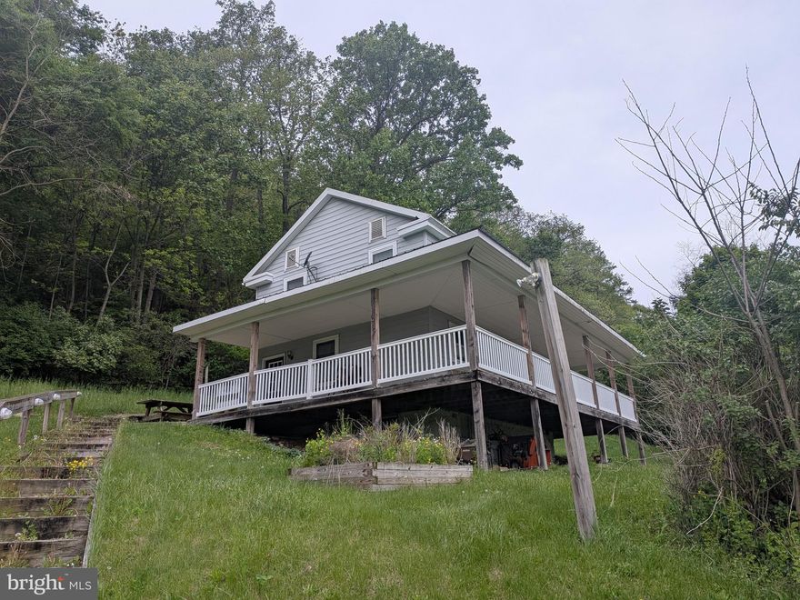 Don't let the small square footage fool you, this place has a lot to offer.  The open layout, 3 bedrooms, and 1.5 baths provide plenty of room for you and your family.  On top of that, with 6 acres, there is plenty of room to expand the home in the future.  Entertainment space galore on all four sides of the house and with both huge side yards.  If that isn't enough, hike and explore your 6 acres on the side of the beautiful ridge.  All of this is conveniently located just outside of Mifflin and Mifflintown.  You will be less than 5 minutes from the community pool, schools, groceries, and other conveniences.  In addition to that, you are less than 10 minutes from Route 322.  Call today for your personal tour.