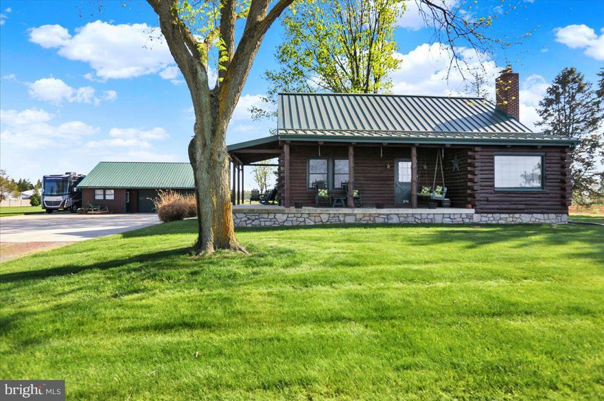 Charming Log Cabin on 2 Acres with Scenic Country Views

Escape to peaceful country living in this beautifully maintained 2-bedroom, 2-bath log cabin nestled on 2 picturesque acres. Featuring a spacious open-concept layout, this home offers warm wood interiors, an inviting open staircase, and radiant floor heating in the kitchen and dining area for year-round comfort.

Enjoy the durability and style of a metal roof, along with the efficiency of a newer furnace and central A/C system. Step outside and take in the breathtaking views, or store all your gear in the oversized detached 3-car garage—perfect for vehicles, tools, or a workshop.

Whether you're looking for a serene weekend getaway or a full-time homestead, this one-of-a-kind property offers rustic charm and modern convenience in a truly beautiful setting.
