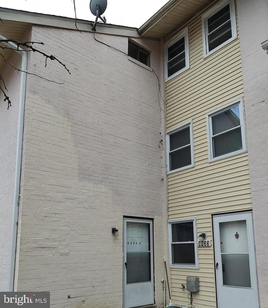 Rarely available ‘piggyback’ home in sought after Oakland Mills. Custom design by developer: 4 level home with 2 separate living quarters with separate street level entrances and no interior access between the homes! The property contains 4 bedrooms and 2 full baths. One portion of the property, the 9433 section is set back as you approach the property.  It is a 3-level townhome and the other section, 9433A, set to the left as you approach the property,  is a 1-bedroom apartment situated above it! While both living quarters are currently subject to leases, eventually it will be possible for the property owner to either live in 1 portion of the property and rent out the other portion of the property or to continue renting both sections of the home. The entry level of the 9433 portion of the property features a living room, dining room and a fully equipped kitchen. The upstairs has a primary bedroom with an on-suite bath, as well as 2 additional bedrooms and a full bathroom in the hall. THE LOWER LEVEL IS UNIQUE WITH A FULL BATH AND A BEDROOM/  recreation area, laundry room, full bath and sliding glass doors to the fenced yard. 9433A section has its own exterior entrance. The 9433A front door leads to an interior private staircase that climbs over the townhouse and leads to a separate 1-bedroom apartment on the 4th level features a primary bedroom with an on-suite bath, 2 additional bedrooms and a second full bath. The tenants enjoy plenty of privacy. In addition to there being no interior access between the 9433 and 9433A sections, there are no houses behind this piggyback home!
The The 9433 tenant  pays $2100 a month in rent and the 9433A section currently pays $950 a month and will pay $1100 a month in rent starting March 2024.
The home is convenient to everything Columbia has to offer. Extremely close to Merriweather Post Pavilion. Easy commute to Fort Meade. Convenient to commuter routes 32, 29 and I-95. The home is convenient to many parks, including Blandair Park. The area contains walking trails; lakes, shopping; restaurants; etc.! Take advantage of this opportunity to add a rare piece of real estate to your portfolio.