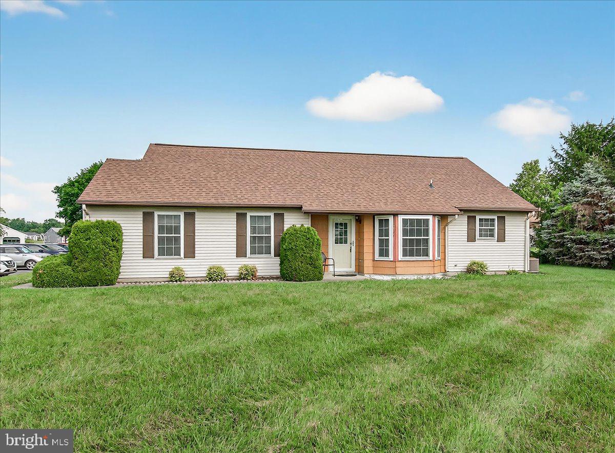 Proudly presenting another fantastic listing in Crestwood Village, a 55+ active adult community. This beautifully renovated 1,300 sq ft end-unit Fairfax model is larger than most of the basic duplexes and has been updated from top to bottom. Renovations began in 2017 with new windows, doors, and blinds, followed by a full kitchen remodel in 2018 featuring upgraded cabinetry, granite countertops, a tile backsplash, and stainless steel appliances. A new architectural roof was added in 2021, and in 2023, the home received all new flooring and a refreshed bathroom with a stunning new shower surround.
Fresh paint throughout and a retractable awning on the private side porch complete the package. There is even a separate laundry room /storage room that has pull down attic steps for added storage. Tucked away at the end of a quiet cul-de-sac, this home offers the privacy and feel of a detached property and overlooks open green space where you can enjoy peaceful sunsets and watch wildlife at play.
Crestwood Village amenities include a clubhouse, fitness center, library, banquet room, game and billiards rooms, swimming pool, mini golf/putting green, tennis & pickleball courts, horseshoes, shuffleboard, and more. The HOA also provides lawn care, gutter cleaning, and snow removal—all with no city taxes and easy access to shopping, dining, Downtown Frederick, and major commuter routes. Don’t miss your chance to make this stunning home your own!
