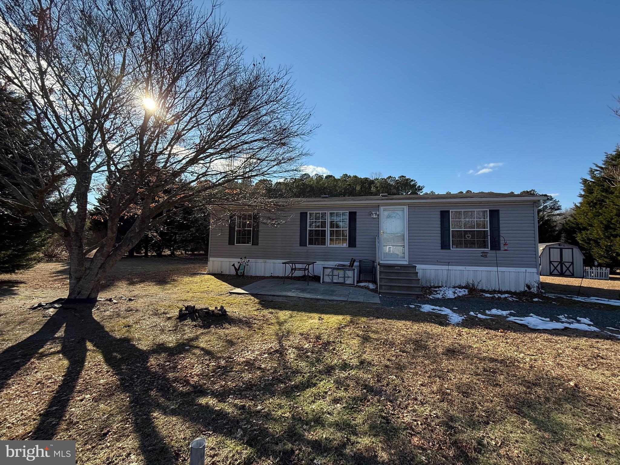 BACK ON THE MARKET! Home Inspection showed only two issues and one is adding a handrail out back and the other is changing a toilet seal! That's all and the seller is fixing these anyway. Great for primary home or for a nice private place near the beach! Well maintained double-wide home in quaint 35 lot community in Berlin, MD, voted the best small town in America a few years ago. Berlin has eclectic shopping, great food, antique stores, and more. Sunset Lakes is a mere 20 minutes from Ocean City and the beaches for fun & sun and more dining options. Split floor-plan with a primary suite with walk in closet and new upgraded kitchen appliances. Community water system and individual septic systems for each lot. Lot rent is $595/month and includes water and trash service. Easy to show and priced to sell. Park owner has approved the property for sale and will need to approve the buyer as well.