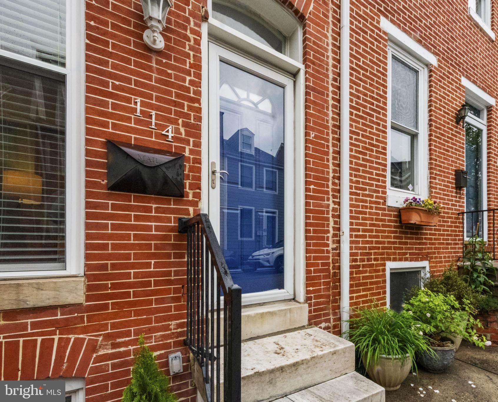 SUNDAY OPEN HOUSE CANCELED! Located in the heart of Federal Hill on a block known for its welcoming neighbors, this 2-bedroom, 2.5-bath home offers modern updates, city convenience, and solid character. The kitchen, primary bath, and windows were updated in 2021, the rooftop deck was redone in 2024, and the roof and HVAC were replaced in 2020: updates galore! Bright natural light fills the property on every level, and hardwood floors run throughout. Main-level laundry and ample storage add everyday practicality — a rare find in city living. This home is fully updated, well-maintained, and truly move-in ready!