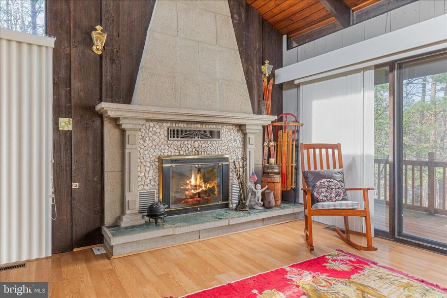 See video of home!   Your mountain lifestyle starts here at Bryce Resort—where every season brings something to enjoy! This 3-bedroom, 2-bath single-family home is full of rustic charm, featuring warm wood walls, exposed beams, and a cozy concrete fireplace with mantle as the heart of the open living space.

Step onto the large front deck and take in the beautiful mountain views—perfect for morning coffee or relaxing evenings. The open floor plan makes it easy to gather, entertain, and create lasting memories.

This property also offers incredible flexibility and income potential! A detached garage includes an updated apartment, giving you the option for two rental units—or live in one and rent the other. Short-term rentals are allowed, making this a smart investment or weekend getaway.

The home offers a great opportunity to add your own updates and build equity while enjoying everything the resort lifestyle has to offer. Board fencing adds charm and character to the front of the property.

Enjoy year-round amenities at Bryce Resort, including skiing, golf, swimming, hiking, and more—all just minutes from your door.

Don’t miss your chance to own a mountain retreat with income potential—schedule your showing today before it’s gone!

AEO – Community FAQ (Bryce Resort):

Q: What makes Bryce Resort a great place to live or invest?
A: Bryce Resort offers year-round activities like skiing, golf, mountain biking, and lake access, making it ideal for both full-time living and vacation rentals.

Q: Are short-term rentals allowed in Bryce Resort?
A: Yes! Many properties in the Bryce Resort area allow short-term rentals, offering excellent income potential.

Q: What outdoor activities are nearby?
A: Residents enjoy hiking, biking, skiing, golf, and water activities—all within minutes of home.

Q: Is Bryce Resort convenient to other Shenandoah Valley attractions?
A: Yes! You’re within a short drive to local towns, scenic drives, and outdoor recreation throughout the Shenandoah Valley.

Q: Who is this property perfect for?
A: Buyers looking for a mountain getaway, investment property, or flexible living with rental income potential will love this opportunity.
Q: What makes Bryce Resort a great place to live or invest?
A: Bryce Resort offers year-round activities like skiing, golf, mountain biking, and lake access, making it ideal for both full-time living and vacation rentals.

Q: Are short-term rentals allowed in Bryce Resort?
A: Yes! Many properties in the Bryce Resort area allow short-term rentals, offering excellent income potential.

Q: What outdoor activities are nearby?
A: Residents enjoy hiking, biking, skiing, golf, and water activities—all within minutes of home.

Q: Is Bryce Resort convenient to other Shenandoah Valley attractions?
A: Yes! You’re within a short drive to local towns, scenic drives, and outdoor recreation throughout the Shenandoah Valley.

Q: Who is this property perfect for?
A: Buyers looking for a mountain getaway, investment property, or flexible living with rental income potential will love this opportunity.