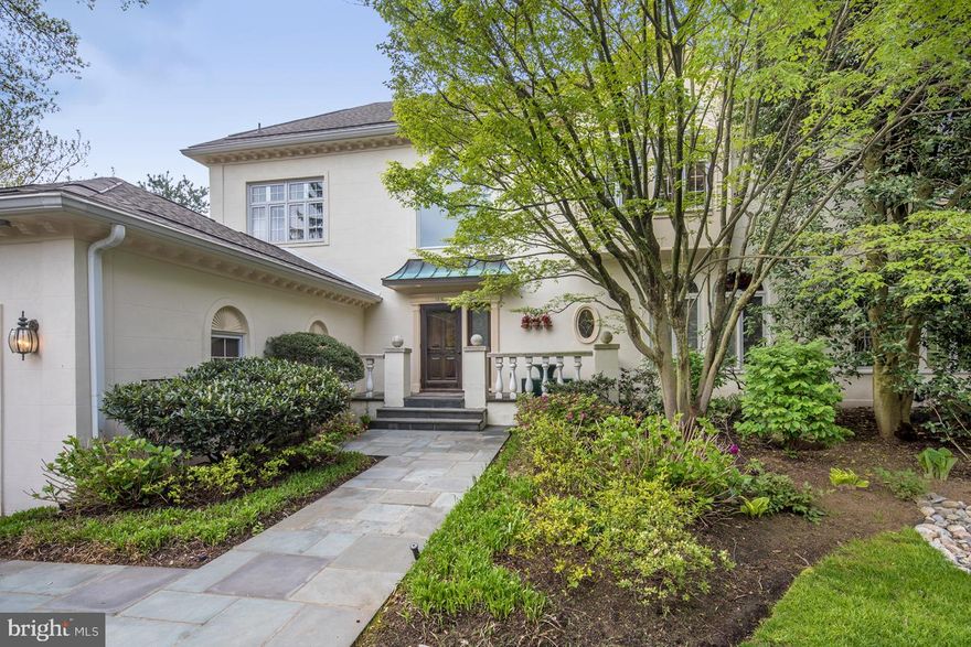 Elegant Townhouse with Private Pool in Gated Wrenfield. Enjoy the finest standard of carefree living in the coveted, gated community of Wrenfield in prime Villanova. This beautifully designed and updated French Colonial end-unit townhouse with a private heated pool, elevator to 3 floors, and built-in 2-car garage with mudroom entry into home is absolutely stunning. A soaring 3-story foyer with a grand sweeping staircase greets your arrival, met by rich new hardwood floors, new double entry closets and generous natural light.   Relax and entertain in the beautiful living room with a wood burning fireplace and dual sets of French doors to a large peaceful outdoor deck. The living space extends to an open library with built-in bookshelves and arched windows inviting in beaming sunlight. Formal and casual meals have an ideal backdrop in the elegant dining room with custom modern wood burning fireplace, and lovely breakfast room brightened by greenhouse-style windows. The sleek gourmet kitchen, impeccably renovated, boasts new stainless steel appliances.Wolf 6-burner gas (propane) stove & oven with vent hood, Sub-Zero fridge, 2 Bosch dishwashers, granite counters & center island with seating, decorative & fun tile backsplash, plus abundant cabinetry storage. The open breakfast room leads out to the amazing deck overlooking the heated pool and private scenic grounds. Also updated 5 wood burning fireplaces, an exceptional interior/exterior lighting plan, conversion to propane gas cooking, and an updated master bathroom providing a spa experience. Upstairs sits your serene master bedroom suite with a wall of newly added built-ins plus a generous walk-in and 2 more closets. Unwind in the fabulous master bath featuring a vaulted ceiling, built-in cabinetry, artistically designed tiled walls, marble-top vanity & makeup counter, walk in shower with seating bench. The 2nd floor also offers a guest bedroom suite with large closet (plumbing in place for 2nd fl. laundry) and full bath with stall shower and jacuzzi bath. A den/sitting room with wood burning fireplace and built-ins is a quiet spot for reading/office/meditating. The updated 3rd level bedroom is chic and roomy with a walk in closet and a multicolored tile full bath with glass tiled floors boasting an air-jet tub and large walk in shower and linen closet. Parties are perfection on the day-lit lower level with a big rec room, 2-sided wood burning fireplace, family room, full kitchen & bar, laundry and full bath. Three sets of glass French doors open to the new covered patio with overhead fan, and in-ground heated pool with safety fencing. Located in a very quiet and private interior lot at the very end of Canterbury Lane! And last but certainly not least, a whole house generator!  Pet Friendly community!