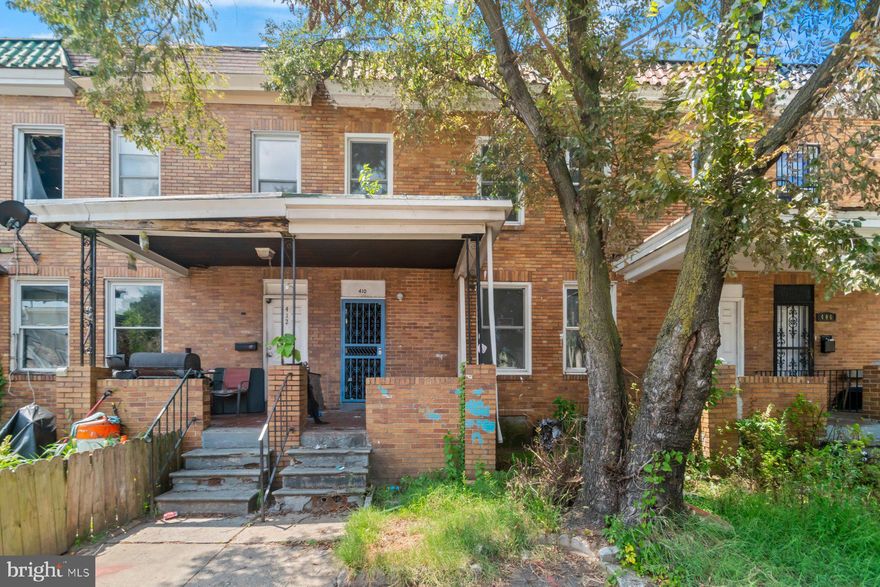 Looking for an investment property, or new homeowner looking for a DIY project, then this home is right for you.  It offers you the opportunity to create the living space needed to host a new family featuring a 3BR/1.5BA brick Townhome with original hardwood floors and two floors of living space.  The main floor has a living room, dining area, half bath and kitchen.  The second floor hosts three bedrooms and a full bath.  The yard is fenced and in need of a good clean up.  This home offers so many opportunities for your ideal home, or investment property.  Located in close proximity to shopping, restaurants, and commuter routes.