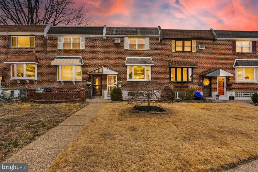 Welcome home to this impressive and meticulously maintained 3 bedroom, 2.5 bath,  row home located on a quiet street that's adjacent to the picturesque Pennypack Park in the sought-after Holme Circle Section of NE Phila.  Approaching you will immediately recognize the pride of ownership is evident with lovely curb appeal which boasts tasteful landscaping and a well maintained exterior.  Enter to find a bright and spacious living room that showcases an oversized front bay window that allows an array of natural light throughout and stunning wide plank flooring.  The main level also features a large dining room with chair rail molding, an exquisite chandelier, and sliding glass door that leads to the large rear deck that looks out on the extensive yard as well as the scenic park views. The beautifully updated eat-in kitchen displays plenty of cabinetry,  recessed lighting, under cabinet lighting,  built-in stainless steel appliances, granite counter tops, hardwood flooring, a custom built breakfast bar and a half bath at the top of the steps. The upper level boasts 3 spacious bedrooms, all with ceiling fans & adequate closet space, as well a spectacular ceramic tile surround hall bathroom with new vanity and fixtures.  The expanded lower level is completely finished and provides additional living space which is suited perfectly as a family room, rec room, possible 4th Brm. This magnificent level  offers a stack stone gas fireplace, private office (bonus room) with pocket doors, custom shelving, and FULL bathroom with stall shower.  Even the separate laundry area has been customized and includes all the amenities. There is private parking in the back as well as an additional grass plot behind the home.  Additional features include brand new HVAC 2022, updated electric service, close proximity to shopping, schools, and all major highways. This home has been  extremely well cared for and entirely improved throughout the years and it clearly shows....!!