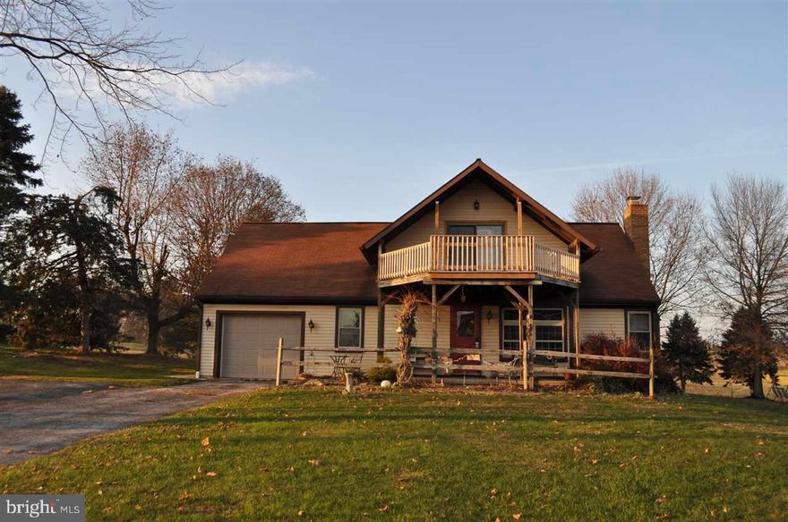View of the country from back to front   This modified A-frame was designed and built by Owner   Walk in and feel right at home!  Living room has wood burning fireplace with insert   1st floor master bedroom   1st floor laundry   All Seasons Florida Room   3 bedrooms on 2nd floor with full bath.