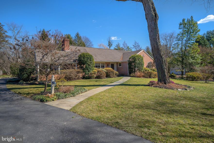 This inviting stone cape styled home presents a comfortable and functional layout, ideal for easy living on the first floor. The expansive plan encompasses a family room with a soaring cathedral ceiling, seamlessly connected to a bright and airy kitchen featuring a spacious seated island. As you step through the covered entryway, you're greeted by a traditional foyer with a practical office space on one side and a cozy fireside living room on the other. Adding to the charm is a covered terrace, offering an inviting extension for gatherings or quiet relaxation. Transitioning from the living room through a wide cased opening, you'll find a generously sized dining room adorned with wainscoting, facilitating seamless flow and service to the kitchen. The primary bedroom suite is a retreat unto itself, boasting a generously sized walk-in closet and an updated bath equipped with a comfortable seated shower and double vanity. Additionally, the main level offers another well-appointed bedroom with an adjacent full bath, a convenient laundry room, a powder room, and easy access to a 2-car garage, complete with ample storage solutions. Ascending the stairs, you'll discover two more bedrooms, each featuring hardwood flooring, and a shared bathroom. An additional room, bathed in northern light and boasting a substantial walk-in closet, serves flexibly as an art studio, children's play area, or home office. The lower level, with its high ceilings and walk-out access, offers potential for further customization, whether as open storage or a partially or fully finished space. Nestled in the sought-after Bryn Mawr locale, this home is poised for seamless transition and comfortable living.
photos are virtually staged