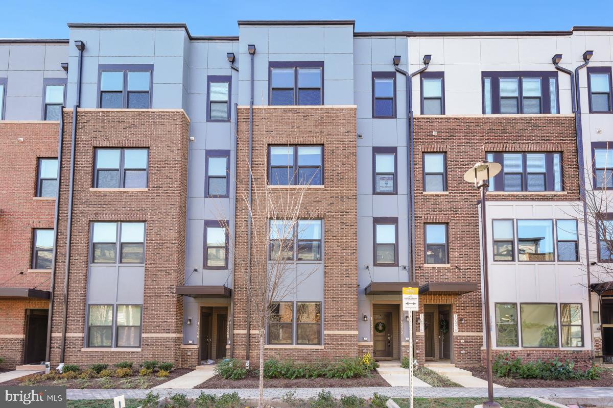 Spacious and Modern Townhome-Style Condo in Rockville!
Welcome to this stunning 2-year-young property offering over 1,700 square feet of beautifully designed living space across two levels. This 2-bedroom, 2.5-bathroom home combines contemporary style with convenience, perfect for today's modern lifestyle.
Main Level highlights include an open concept layout. There is a bright and airy feel with high ceilings, large picture windows, and durable luxury vinyl plank (LVP) flooring throughout. The gourmet kitchen features custom cabinetry, sleek quartz countertops, stainless steel appliances including a double wall oven, and a spacious peninsula—ideal for entertaining or casual dining. This level also includes a stylish powder room, ample closet space, and direct access to the attached garage.
The upper level includes a luxurious primary suite with a spacious walk-in closet and a spa-like ensuite bath, complete with a dual-sink vanity and an elegant glass-enclosed tile shower. There is a family room on this level offer tons of flexibility and offering access to a private outdoor deck with views of the community. The secondary bedroom is generously sized with easy access to a full hallway bath. There is also bedroom-level laundry conveniently located for added ease.
Situated in an ideal commuter-friendly location within walking distance to Shady Grove Metro Station and other public transit. Enjoy quick access to I-270 and Route 355, as well as nearby amenities at The Grove shopping center, featuring restaurants, retail, and more. Condo fee includes water/sewer charges, and the property comes with 2 guest parking passes. Community amenities include a swimming pool, fitness center, walking paths, playground and more.
Don't miss this exceptional opportunity to own a like-new, move-in-ready home in a vibrant community!