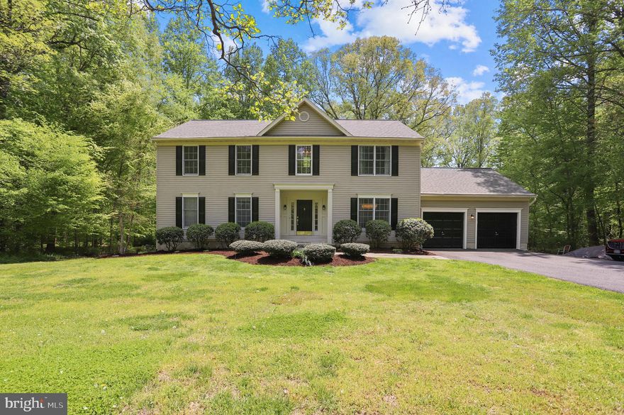 This gorgeous colonial offers over 4000 square feet of finished living space on a 1.45 acre lot that provides privacy and backs to trees.  The main level offers many desirable features such as an at home office, hardwood flooring, owners bedroom with en suite bathroom, formal dining and a family room with a gas fireplace and cathedral ceilings.  The updated kitchen features stainless steel appliances, gas cook top, granite counter tops, backsplash and large island.  On the upper level you will be greeted by a roomy loft space that could serve multiple purposes.  There are 4 additional bedrooms, one that could be considered an additional master with an en suite bathroom.  Both upper level baths have been updated and the fourth bedroom is currently being utilized a fabulous dressing room.
The lower level is walk out level, oversized and can be used as a rec room or secondary living room. It also has a gas fireplace.  There is a ton of storage and additional room that has been turned into an at home gym space.  The lot is 1.45 acres, is mostly level and backs to trees. There is a new concrete pad located off the sliders in the basement, a deck off the kitchen, and a fire pit to enjoy your privacy on chilly nights. Don't forget the oversized 2 car garage and multi car driveway. All this in the sought after Tall Oaks Community.