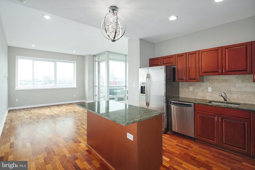This 2 bedroom 2.5 bath super spacious condominium offers floor to ceiling windows with a 10ft ceiling height and also an over-sized balcony to enjoy the magnificent up-river water views of the Delaware River, Benjamin Franklin Bridge, and the amazing Center City Philadelphia Skyline. Features include a gorgeous granite eat in kitchen with stainless steel appliances and spacious island flowing nicely in to the huge living area with cherry hardwood flooring. Each spacious bedroom also has awesome walk in closet space and each comes with its own full bathroom. Condo Waterfront Square amenities are second to none and include: Philadelphia's largest Green Roof, Putting Range, State of the Art Fitness Center, Lap Pool, River Deck, Sauna, 24hr Valet/Concierge, Yoga and Pilates Classes (additional charge), Two fenced Dog Parks, and a daily Shuttle Service to Center City. Waterfront Square is easily accessible to all Major Highways and Bridges. Also walking distance to all the great Restaurants and Cafes Northern Liberties has to offer.