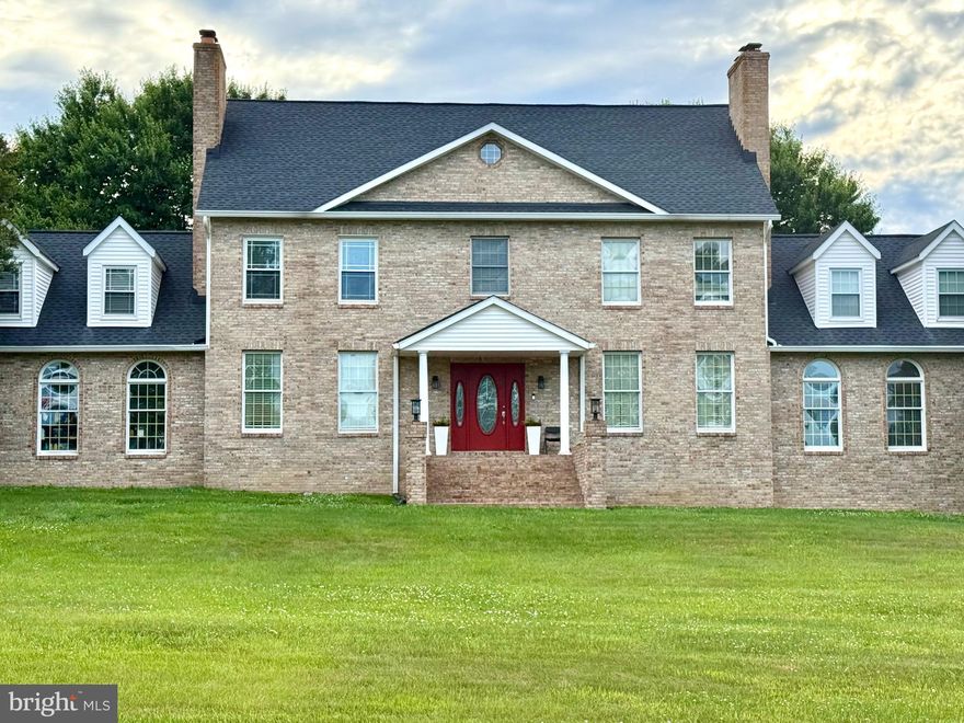 **Grand Colonial Retreat on 2.85 Private Acres – A Rare Opportunity!**

Welcome to **75 W Bay Front Rd**, a stately all-brick Colonial offering over **6,000 square feet** of beautifully designed living space on nearly **3 private acres** in desirable Lothian, Maryland. This impressive **6-bedroom, 3.5-bath** residence perfectly blends timeless elegance with modern comfort.
Step inside to discover expansive living spaces, classic architectural details, and **five fireplaces** creating warmth and character throughout. The heart of the home is a spacious, updated kitchen featuring beautiful renovations—perfect for everyday living and effortless entertaining. Renovated bathrooms add modern luxury and style throughout the home.
The thoughtfully designed floor plan offers multiple formal and informal gathering spaces, ideal for hosting family and friends. A private **au pair/in-law suite with separate entrance and full amenities** provides exceptional flexibility for multigenerational living, guests, or extended stays.
Outside, enjoy beautifully landscaped grounds, abundant privacy, and endless possibilities across **2.85 acres**—all while being conveniently located near major commuter routes, shopping, dining, and the Chesapeake lifestyle.
**Bonus:** Assumable loan available at **4.25%** for qualified buyers.
This is more than a home—it’s a lifestyle.