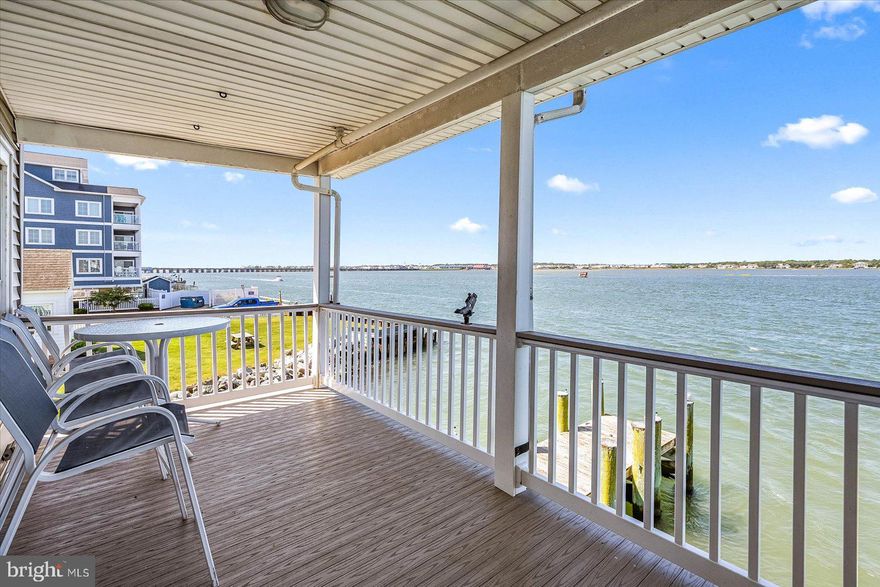 Welcome to your direct bay-front paradise in the heart of downtown Ocean City, MD! This stunning 2-bedroom, 2-bathroom condo at the Islander Condominium is your ticket to coastal living at its finest.

Step inside, and you'll be immediately captivated by the breathtaking bay views that greet you from every corner of this haven. With an open floor plan this newly refreshed condo transports to a beach-cottage feel reminiscent of times past, with all the modern luxuries you'd expect today.    

Enjoy captivating panoramic bay views from Kitchen, boasting recent updates that include sleek countertops and modern appliances.  Imagine cooking up your favorite seafood dishes here while gazing out at the tranquil bay waters.     Recently installed LVP flooring throughout the main areas offer stress-free living for beach-goers and avid-fishers alike.    

But the real star of the show? The expansive private waterfront balcony! It's the perfect spot for morning coffee with a sunrise view or evening cocktails as the sun sets over the bay. You'll never tire of the ever-changing canvas of colors Mother Nature provides.

This condo is not just about aesthetics; it's packed with practical upgrades too. A brand-new HVAC system ensures year-round comfort, and a new sliding glass door seamlessly connects your indoor and outdoor spaces. Plus, boating enthusiasts will be thrilled with the remote-controlled Golden-7500lb boat lift in your private deep-water boat slip - making water adventures a breeze.    Yes, this condo comes with Slip #3, a deep water slip, ready for just about every boater, ensuring a quick boat ride to inlet for fishing in ocean.   We’re talking fishing so good you can do it right from home….. Flounder, Rockfish, Bluefish, Tog and certainly Maryland-Blue-Crabs!  Living in this bayfront beauty is like having a permanent vacation. Whether you're looking for a full-time residence or a weekend getaway, this condo has it all.   Featuring easy access to OC's famous Boardwalk, and a short drive to Route 50 bridge, this is all about location...location...location.  Don't miss your chance to experience the magic of Ocean City from your own private piece of paradise. Come see it today and let the bayfront breeze sweep you off your feet!

Property is enrolled with Central Reservations for the 2025 vacation rental season.  Existing rentals must be honored.