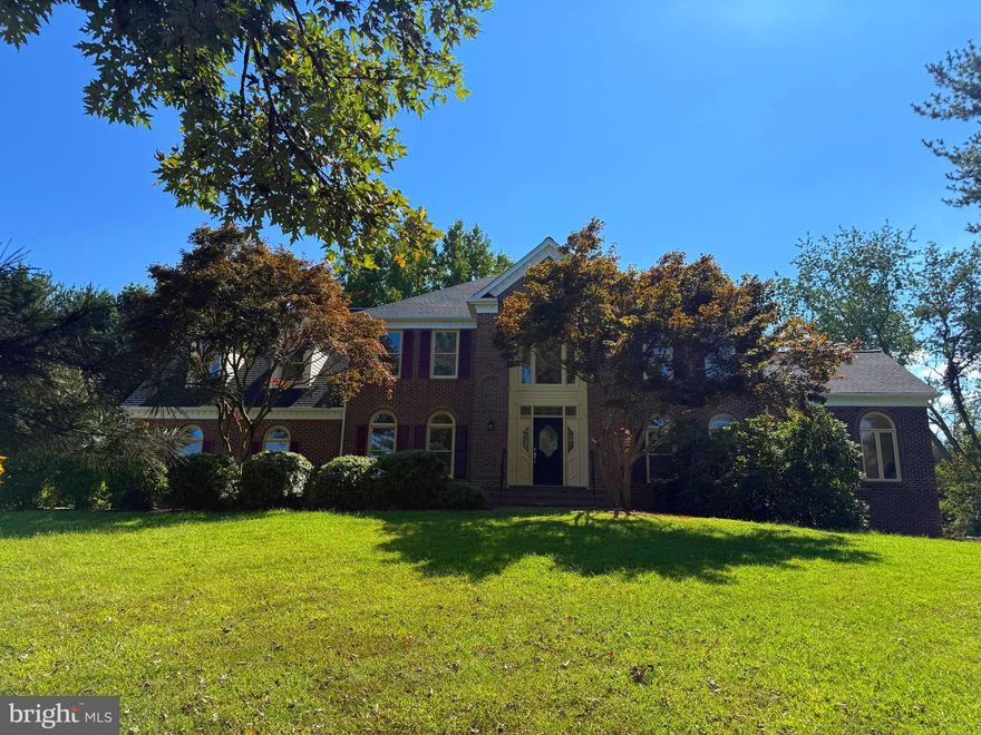 Welcome to an extraordinary 2-acre Colonial, comprised of 5,406 square feet, featuring over $150K remodeling upgrades in 2025.  This delightful property is nestled at the corner of Flintridge Drive and Sundown Road.  The main floor consists of a renovated kitchen with brand new stainless steel appliances, contemporary white cabinets, and flawless quartz countertops.  The FIRST FLOOR,  step into the grand two-story foyer with gorgeous hardwood flooring.  Formal LIVING and DINING ROOMS show off nearly floor-to-ceiling windows and the beautiful crown molding.  The bright SUNROOM with windows floods the space with breathtaking natural light.  The cozy FAMILY ROOM with a wood fireplace offers a relaxing and restful retreat.  Additionally, the oversized three-car garage includes windows and ample storage.  UPSTAIRS, a luxurious PRIMARY SUITE is inviting for a good night’s rest.  The master bedroom and library offer a quiet respite with new wall-to-wall carpeting.   The ensuite bathroom includes a contemporary full bath with a walk-in shower and an elegant freestanding, soaking tub.  Walk into three separate bedrooms with ceiling fans and new carpeting. Lower-level BASEMENT is a spacious, sunlit haven of relaxation, with new flooring and a large recreation room and a WET BAR, opened to the backyard through French doors. A full bath is accessible to the fifth bedroom in the lower level as well.  This beautifully upgraded Colonial masterpiece blends classic charm with modern luxury.  It offers spacious, light-filled living and high-end finishes—making it a truly exceptional and inviting home.