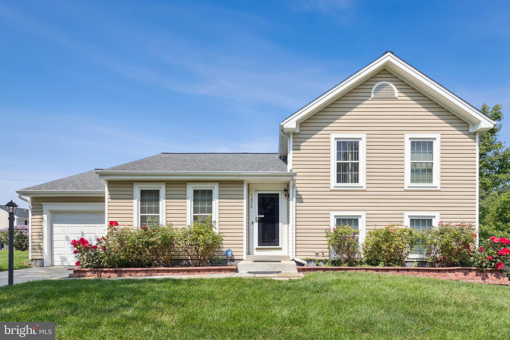 Pristine and meticulously kept single-family home that sits on a CORNER LOT! Great opportunity to own a sun-lit, bright, airy, 4-bedroom 2.5 bath home! A “good to be home” feeling with a sense of community and family is what you will find here. Spaces are crafted by a refined and highly atypical split-level floorplan.
It offers FOUR LEVELS of living space with gleaming luxury vinyl plank (LVP) floors, full size living room, full-size dining room, eat-in-kitchen, large deck and 2 basements. The home invites you into the living room with a cathedral ceiling.
Just 4 steps to the lower level and you will enjoy the first basement. It has a multitude of opportunities: family room, game room, workout room or office. It also has a SEPARATE bedroom with a half bath that could serve as the guest room or an in-law suite.
You will fall in love with the 2nd lower-level finished basement. It offers so many options: quite space, party room, etc. Need storage space? You will find it here!
Newer HVAC, washer and dryer, sump pump and attic insulation. Have a “green thumb”? Enjoy the mature rose bushes that add beauty and value to the home.
Set the stage for a show-stopping Anne Arundel County lifestyle! The superb market location brims steps away from shopping, dining, and doing! Curious about what makes Anne Arundel County so wonderful? Live like a local and find out for yourself. Amazingly priced. Convenient to routes 97, 100, 95 and the BW Parkway. Schedule your tour today!