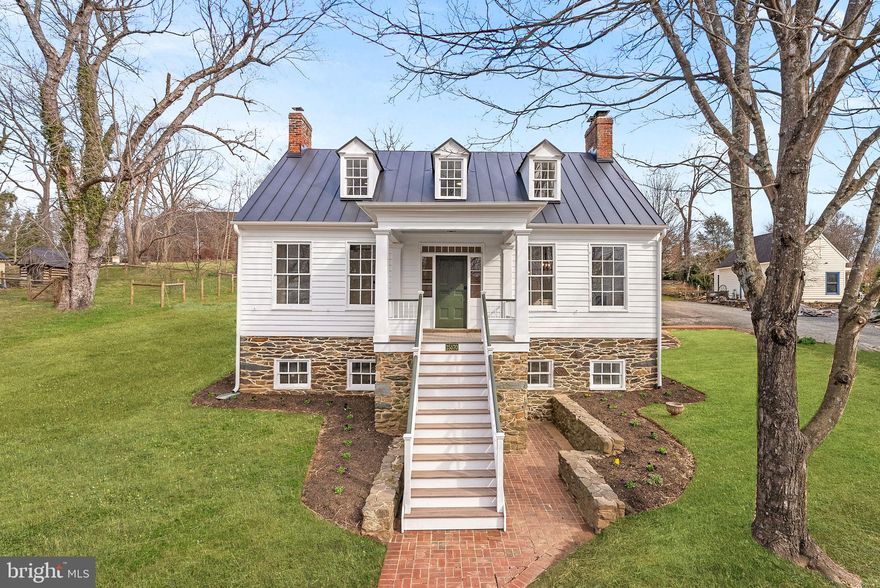 * Price Improvement* Builder Offering 1 Year Warranty on Renovation* Welcome to Sunnyside. Located within the Village of Waterford, a National Historic Landmark. Built in 1848 by John Dutton and the location where the Waterford News was written during the Civil War. The Waterford News was smuggled out of Waterford to Baltimore where it was published. At least one of these publications is in the Library of Congress as part of President Abraham Lincoln's papers. Historic charm meets modern convenience, from the gourmet eat in kitchen to the luxurious master bathroom, no detail was overlooked upon its careful restoration. Offering 4 bedrooms and 3.5 baths with main level living, Sunnyside underwent a complete restoration concluding in 2025, by local Historic Restoration experts, Carpenter Beach Construction. Walk in the side entrance and be welcomed to a large gourmet kitchen with immense island. Luxury level Wolf duel fuel range and Viking refrigerator are any chefs dream. All new shaker style cabinetry and leathered quartzite countertops will make this room the center piece for family gatherings. A side mudroom area is perfect for coat and shoe storage. Continue to the historic part of the home with an oversized living/dining area with built ins ready for a personal library collection and wood burning chimney to create a cozy environment. Large sunken home office is set up with multiple work stations for the working professional or completing schoolwork. Move to the main level master bedroom/bathroom with walk in his and hers closets. Step into the master bathroom with a large custom marble walk in shower with dual shower heads and detachable wand. A slipper soaking tub sits under a historic picturesque window with a view of the village. Stand in front of the double vanity with warmth on your feet, as the heated tile floor makes getting ready a joy. Move up the original restored staircase and find hallways to three more bedrooms with plenty of closet space. Another large custom bathroom with tub and dual vanity serve all the secondary bedrooms. Move to the basement and be welcomed into the rec room with another fireplace set up for a wood or pellet stove. Full bathroom in the basement can serve a potential 5th bedroom if desired. Upgraded 400Amp Square D electric service serves the entire home with lots of room for expansion. Dual fuel high efficiency heat pump with propane back up serves the main level and basement heating and cooling. Brand new second zone high efficiency heat pump serves the upper level. Each heat pump has several zones to manage climate independently throughout the home. Brand new State water heater, new sewage ejector pit, sump pump, well pressure tanks with filter have all been installed with new plumbing work. Historic windows have all be careful restored with new glazing. Other exterior features include a new standing seam metal roof on the front gable, complete rebuilt front porch with composite flooring, custom made Sapele stair treads and railings. The entire exterior has been gone through with a fine tooth comb, all rotted wood siding and trim replaced per Department of Interior standards, and painted from top to bottom. The rear half of the home has new Marvin clad windows and fiberglass doors. All new half round gutters and full round downspouts. The 0.72 acre property features a carriage house, historic well and ice house all protected by the Virginia Department of Historic Resources. Carriage house garages one car, with adjacent main level shop or storage, walk up the brand new stair case to a 500 square foot space with electric ready for a guest suite or other finished living space. The complete structure was rebuilt wall by wall with German lap wood siding, brand new metal roof, wood window sash, and new 100 AMP electric sub panel. Enjoy outdoor living with large new brick masonry patio and field stone retaining wall. Don’t miss the opportunity to tour this gem in Historic Waterford.