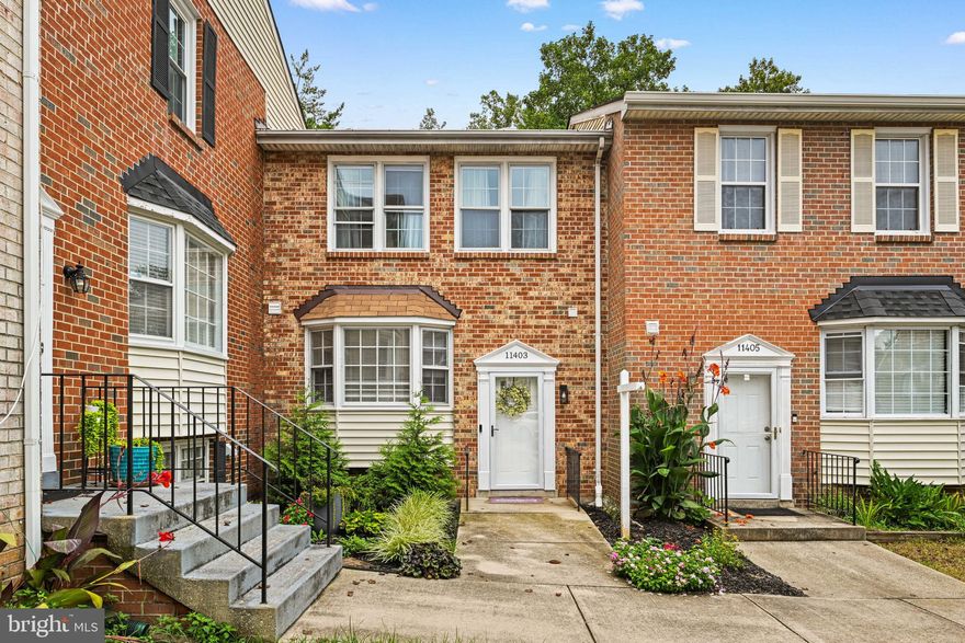 PRICE REDUCTION: MOTIVATED SELLER BRING ALL OFFERS! Welcome to 11403 Cosca Park Pl, Clinton, MD 20735 –A beautifully maintained 3-bedroom, 2.5-bath townhome with a bonus room offering comfort, space, and convenience .Step inside to discover an inviting layout featuring a bright eat-in kitchen with stainless steel appliances, ample cabinet space, and modern recessed lighting. Hardwood floors flow from the kitchen into the dining area, leading down to a sunken living room with a cozy fireplace perfect for relaxing or entertaining guests. Open the sliding doors to your private deck, which backs to mature trees your own peaceful retreat for morning coffee or evening unwinding. Upstairs, you'll find three spacious bedrooms, including a dedicated owner’s suite with dual closets and a private en suite bathroom. The lower level offers a versatile bonus room that can serve as a home office, den, gym, or guest space tailored to fit your lifestyle needs. Additional features include ample storage, a powder room on the main level, and thoughtful upgrades throughout. Located near shopping, dining, parks, and major commuter routes, this move-in-ready home combines suburban tranquility with everyday convenience. Don’t miss the opportunity to call this gem your own.Schedule your tour today!
