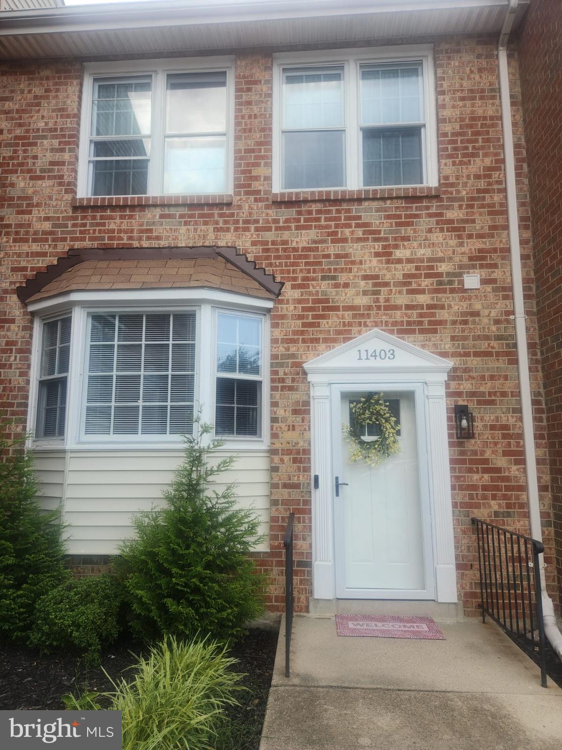 Welcome to 11403 Cosca Park Pl, Clinton, MD 20735 –A beautifully maintained 3-bedroom, 2.5-bath townhome with a bonus room offering comfort, space, and convenience .Step inside to discover an inviting layout featuring a bright eat-in kitchen with stainless steel appliances, ample cabinet space, and modern recessed lighting. Hardwood floors flow from the kitchen into the dining area, leading down to a sunken living room with a cozy fireplace perfect for relaxing or entertaining guests. Open the sliding doors to your private deck, which backs to mature trees your own peaceful retreat for morning coffee or evening unwinding. Upstairs, you'll find three spacious bedrooms, including a dedicated owner’s suite with dual closets and a private en suite bathroom. The lower level offers a versatile bonus room that can serve as a home office, den, gym, or guest space tailored to fit your lifestyle needs. Additional features include ample storage, a powder room on the main level, and thoughtful upgrades throughout. Located near shopping, dining, parks, and major commuter routes, this move-in-ready home combines suburban tranquility with everyday convenience. Don’t miss the opportunity to call this gem your own.Schedule your tour today!