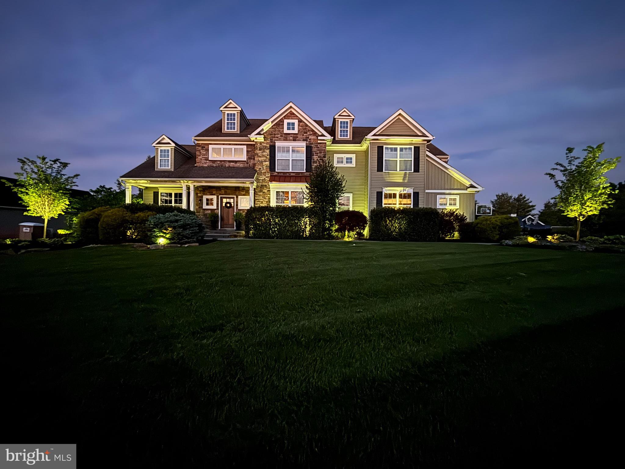Welcome to 303 Tinsman Drive in the Estates of Deep Run
This exceptional property combines luxury living with an ideal location. Set in Bedminster Township—known for its scenic estates and farmland—this sought-after community features just 30 homes set on 70 acres. Each homeowner enjoys an acre of land, access to a walking path, and 40 acres of preserved open space. The current owner has crafted a backyard oasis that's not to be missed. Located in the award-winning Pennridge School District, this home offers over 3,300 square feet of thoughtfully designed living space, perfect for everyday comfort and effortless entertaining.
Step inside to find soaring cathedral ceilings, rich hardwood floors, and elegant touches throughout. The gourmet kitchen is a chef’s dream—featuring quartz countertops, a GE Profile propane cooktop, double ovens, upgraded cabinetry, a double sink, and a center island ideal for prepping or gathering. Adjacent, the formal dining room creates a refined atmosphere perfect for hosting guests, while the relaxing family room boasts a fireplace with custom built-ins and SONOS surround sound. PLUS an Executive in-home office to address business in a private environment. Rounding out the main floor are a utility room, a mud room with custom lockers, and inside access to the expansive 3 car garage.
This 4-bedroom, 4.5-bathroom home is designed for both family life and private retreats. The spacious primary suite offers a sitting room, six windows, two walk-in closets, and a spa-inspired bathroom with a custom walk-in shower, makeup vanity, and quartz double vanity with wood cabinetry. The additional bedrooms feature plush carpeting, ample natural light, and upgraded bathrooms with modern fixtures.
Downstairs, the finished basement adds a versatile entertainment area, a carpeted TV lounge, including a second fireplace, workout/playroom with new laminate flooring, full bathroom, and a custom safe room with 8" concrete walls, shelves, cabinets, and secure storage.
Outside, your private oasis awaits. The backyard stuns with a custom paver patio, Twin Eagles built-in propane grill, Big Green Egg smoker, and a stone fireplace with integrated wood storage. The saltwater, in-ground signature pool is the centerpiece—complete with dual waterfalls, sun deck, spa, basketball net, and heated by two dedicated propane tanks. Surrounded by lush landscaping, mature trees, and a fully fenced-in yard, this space is ideal for entertaining or quiet relaxation. Landscape lighting, an irrigation system, and a Coastal Source outdoor audio system enhance the outdoor experience.
303 Tinsman Drive offers the perfect blend of modern amenities, thoughtful upgrades, and timeless elegance—whether you're entertaining poolside, enjoying peaceful evenings by the fire, or relaxing in your expansive master retreat. This extraordinary property won’t last—schedule your private showing today!