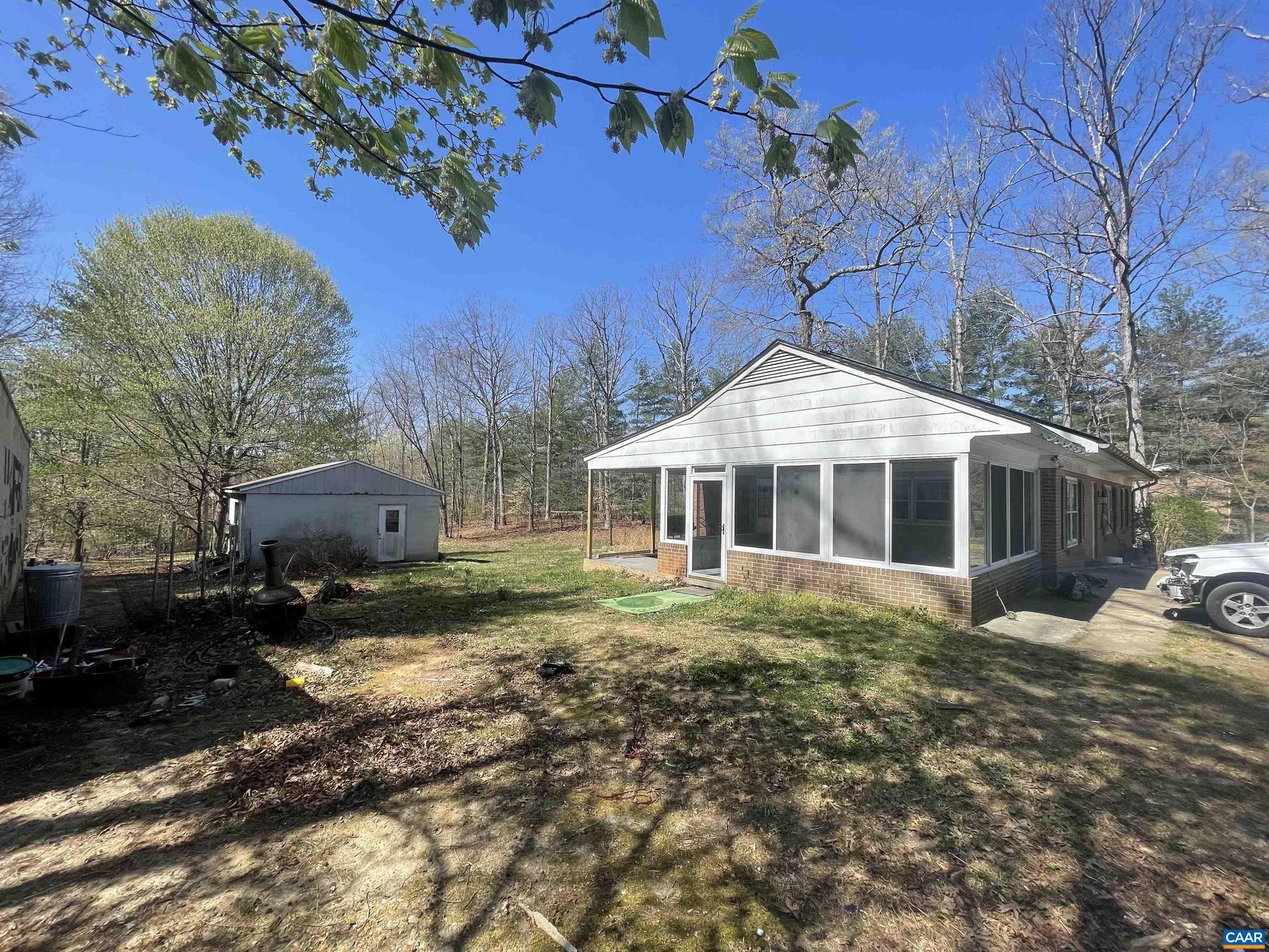 Location, Location, Location! Imagine living in a nicely updated one level 3 bedroom house only 1.5 miles from Preddy Creek Park! Featuring a new Metal Roof, Enormous oversized garage workshop, almost 2 acres of land & extra storage building! The Garage with large roll door and power is 660sq ft. There is an additional block 400sq ft building and the house has a great attached screened porch! This updated Ranch 3 bedroom 1.5 bathroom house has ceramic flooring in dining room, laundry and kitchen. Wood lvp in living room hallway and bedrooms. The updated bathroom is unique and the stainless appliances shine against the painted wood cabinets and butcher block counters. Enjoy the convenience to town; and the privacy of the country all in one place!! Come see this home today!,Painted Cabinets,Wood Cabinets,Wood Counter,Fireplace in Living Room