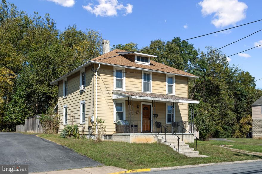 Charming 4-bedroom colonial on 2 city lots (.15 acre) with plenty of room to grow! The main floor features newer LVP flooring in the kitchen, full bathroom, and laundry room. On this level, you will also find a spacious family room as well as living room. Upstairs you’ll find 4 spacious bedrooms, including a versatile room that can be used as an office, den, or gaming space. Enjoy a large fenced yard with 2 storage buildings—one open and one 8x10—as well as an extra-large 14x24 workshop garage. The home also features a new water heater (2024). Conveniently located near main commuter routes, shopping, and dining, this property is perfect for comfortable living or as an investment. A must-see in a great Martinsburg location!