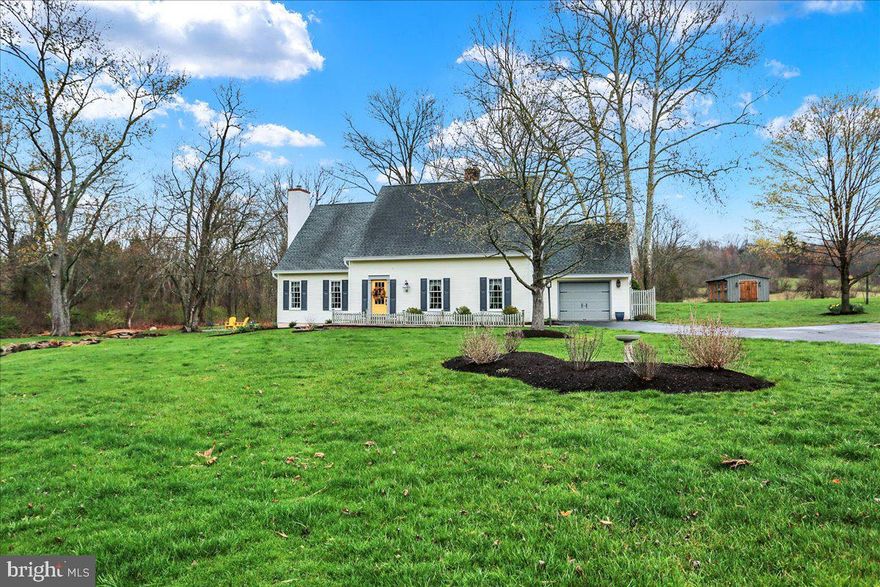 This beautiful Cape Cod style home was built in 1990 but you might think it was built only a few years ago.  The home has been meticulously maintained and most all big-ticket items have been replaced including,  Anderson windows, renovated bathrooms, furnace and central A/C, water heater, new septic tanks, hard wood floors refinished and entire house professionally painted including the kitchen lower cabinets. See the entire list in the disclosures section.
The spring fed creek and three ponds with walkways and multiple paver patios make this home an outdoor oasis to enjoy with your family and friends.  The screened in covered patio is lighted with an overhead fan to enjoy summer evenings outside with some of the indoor comforts. 
When you walk in the front door you will immediately see the care given to the inside matches the outstanding manicured outside.  Two large living room spaces, one to the right and the larger vaulted living space with the built-in fireplace and second floor loft overlooking the living space are wonderful for family fun and entertainment.
The main floor office off the kitchen with the built-in bookshelves is a welcome addition for those who need a space to work from home or quite place to study or read.
The upstairs has four bedrooms, a beautiful large loft that overlooks the downstairs with bright overhead skylights, two full bathrooms, and plenty of storage space. The Master bedroom has two large closets with its own private bathroom with an updated shower.
Welcome to your dream home!