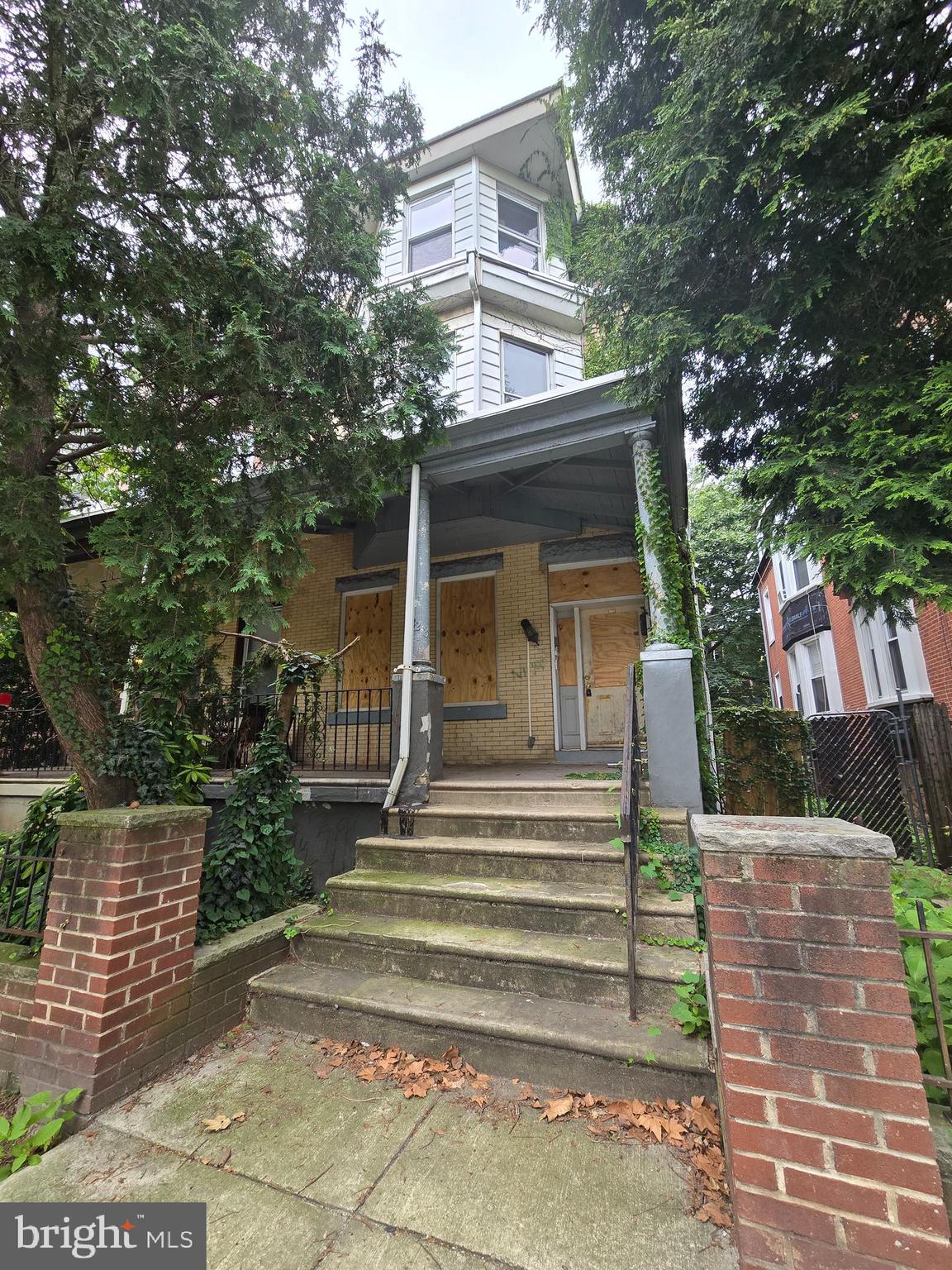 Welcome to a rare investment opportunity in the heart of University City, Philadelphia. This over 3,000 sq ft, 2-family twin semi-detached home exudes Victorian charm, with its century-old character and original features waiting to be restored. Built over 100 years ago, this property is a true fixer-upper, offering incredible potential for the right buyer. The first-floor unit offers 2 spacious bedrooms and 1 bathroom, perfect for creating a cozy living space or renting out. The second-floor unit boasts 3 bedrooms and 3 full bathrooms, with access to an attic featuring a skylight—ideal for expansion or additional storage. A finished basement provides even more possibilities, including the potential to rent out the lower level. Each unit has separate utilities, making this a hassle-free investment for future tenants. The secluded backyard offers a peaceful retreat, while the front porch adds to the property's Victorian appeal. Plus, with access to everything University City has to offer—top universities, restaurants, shopping, and public transportation—this location is unbeatable. With the right vision and budget, this property can be transformed into a stunning multifamily residence or an investment property to build your real estate portfolio. The location, combined with the potential for rental income and the property's many unique features, makes this a prime opportunity for investors or savvy homebuyers. Don’t miss out on the chance to bring this Victorian gem back to life! Images have been enhanced virtually to show possibilities and staging.