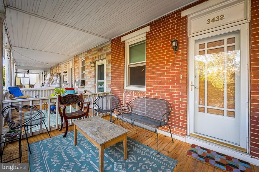 Nestled in the heart of Hampden, this beautifully updated three-story brick rowhome combines historic Baltimore charm with stylish, modern updates.  Enjoy peace of mind with brand-new updates throughout, including new windows, a new furnace, new water heater, new roof, and a brand-new front porch—all the big-ticket items are already taken care of.
Just steps from “The Avenue” and everything that makes this neighborhood one of the city’s most beloved, 3432 Roland offers a rare opportunity to enjoy walkable city living at its best.Step inside to find Open concept spacious living room as it  flows seamlessly into the kitchen, featuring new appliances including a brand new stove , and ample storage.  Cold storage rear porch functions as a pantry and mudroom helping you stay organized.Upstairs, you’ll find comfortable bedrooms and a half bath. The finished lower level offers flexible space for a guest room, home office, or media area, along with convenient laundry, storage, and a full bath. A ground level entrance and large windows make this feel more like main level living space than a basement.Outside, enjoy a welcoming extra large front porch, and small outdoor space in front and back. Just enough for a few plants to enjoy but not large enough to require a green thumb Located minutes from boutique shopping, award-winning dining, and local parks, this Hampden gem offers the true charm of Baltimore living — where historic character meets vibrant community.