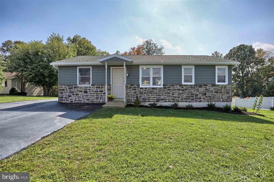 CHARMING REMODELED 3 BEDROOM 2 BATH RANCH HOME WITH NEW HARDWOOD FLOORS THROUGHOUT. NEW BEDROOM, LAUNDRY ROOM & BATH ADDITION.  OVERSIZED LIVING ROOM/ DINING ROOM AREA. NEW ROOF, SIDING, STONE FRONT, DECK, HEAT PUMP & FRONT DOOR. LOVELY FLAT .45 ACRE LOT. GREAT LOCATION AND A PLEASURE TO SHOW!