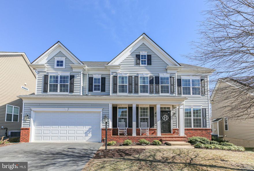 Welcome to this well-appointed home offering three beautifully finished levels and an inviting open floor plan. From the moment you step inside, you'll be impressed by the exquisite woodwork, elegant detailing, and thoughtful design throughout.

The heart of the home is the gourmet kitchen, featuring newly replaced appliances, a center island, and seamless flow into the cozy family room with a warm gas fireplace—perfect for gatherings. Need a quiet workspace? The main-level office with glassed French doors provides both privacy and sophistication.

Retreat to the luxurious primary suite, complete with a spacious sitting room, two walk-in closets, and a spa-like private bath—your personal oasis. Three additional bedroom suites with en-suite bath access to one of two additional full bathrooms are also located on the second level. The laundry room and an office nook with built in desk complete the upper level.

The finished lower level is equally impressive, featuring a private bedroom suite, a media room, a spacious recreation room and a walkout to the beautifully landscaped fenced backyard. Enjoy outdoor living with stamped concrete patios, decorative retaining walls, and a maintenance-free deck, ideal for entertaining or relaxing. The rear yard backs to a wooded common area for added privacy.

Located on a cul-de-sac street in a sought-after neighborhood, this home offers convenient access to shopping, dining, and major commuter routes while maintaining a peaceful, upscale atmosphere.
Don’t miss the chance to make this exceptional home yours—schedule your private tour today!