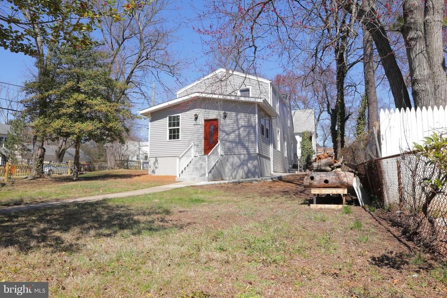 Gorgeous, remodeled home.  Easy commute to DC! Beautifully landscaped front yard & fenced lot. Hardwood floors throughout, separate driveway  & gourmet updated kit w/granite & loads of cabinets/counter space and stainless steel appliances. 1 BR on main level (and office/addi BR), plus 3 upstairs.. 1 full bathroom on main lever, and 2 upstairs.  Minutes from the Arts District, metro & shopping.