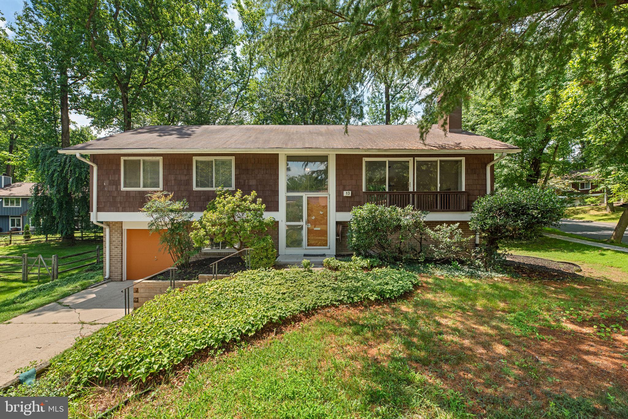 Welcome to 13 Farsta Court— ***BE SURE TO VIEW THE VIRTUAL TOUR TO SEE THE VIDEO TOUR, 3-D TOUR, AND INTERACTIVE FLOOR PLANS*** — a beautifully updated 4-bedroom, 3-bathroom home tucked away on a quiet cul-de-sac in a highly desirable Rockville neighborhood. This light-filled split-level features hardwood floors throughout the main level bedrooms, an updated kitchen, and a spacious living room with a cozy fireplace and soaring cathedral ceilings. All three bathrooms have been tastefully renovated, offering modern style and comfort. ------------
The finished walkout basement provides flexible space for a rec room, home office, or guest suite. Enjoy outdoor living on the upper deck or the lower-level patio—perfect for relaxing or entertaining. A 1-car garage adds convenience, and the community offers fantastic amenities, including a pool, tennis courts, and a basketball court. -------------
With quick access to I-270, the Metro, and downtown Rockville, this home combines suburban tranquility with unbeatable convenience. Don’t miss it!