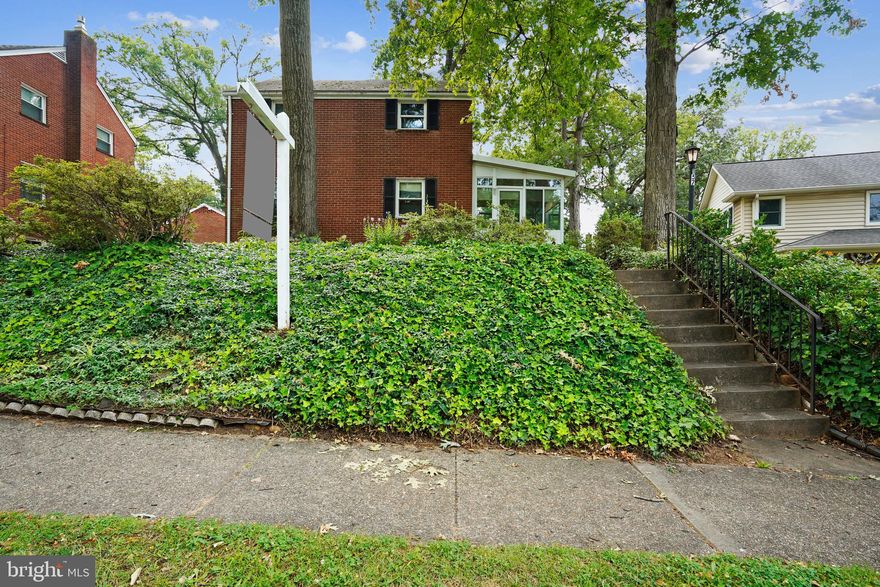 Fantastic brick colonial in the heart of Arlington Forest and steps from Lubber Run Amphitheater/Park/Community Center! Hardwood floors throughout. Great lot! It has a level, fully fenced back yard. This property presents a perfect opportunity to make it your own by adding some TLC and personal touches! Three bedrooms and full bath upstairs. Living room, dining room, kitchen and enclosed porch/foyer on main level. Spacious finished basement with laundry and half bath.  Don't miss it!