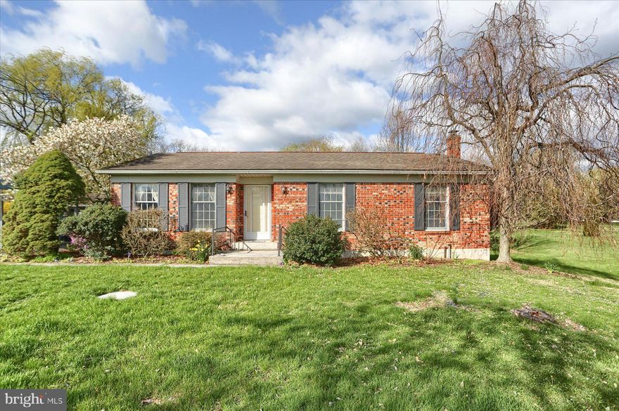 Nice ranch home close to everything!  Walk into a large living room offering lots of space.  There are newer Pergo floors in the kitchen and dining room.  The main bedroom has an attached 1/2 bath for convenience, 
 2 more bedrooms and a full bath complete the main level.  Downstairs is a large dry basement with lots of opportunities to grow. Outside is a large 1-acre lot for all of your outdoor activities.  Sit on the covered back porch and enjoy the scenery.  A detached 2 car carport completes the exterior amenities.