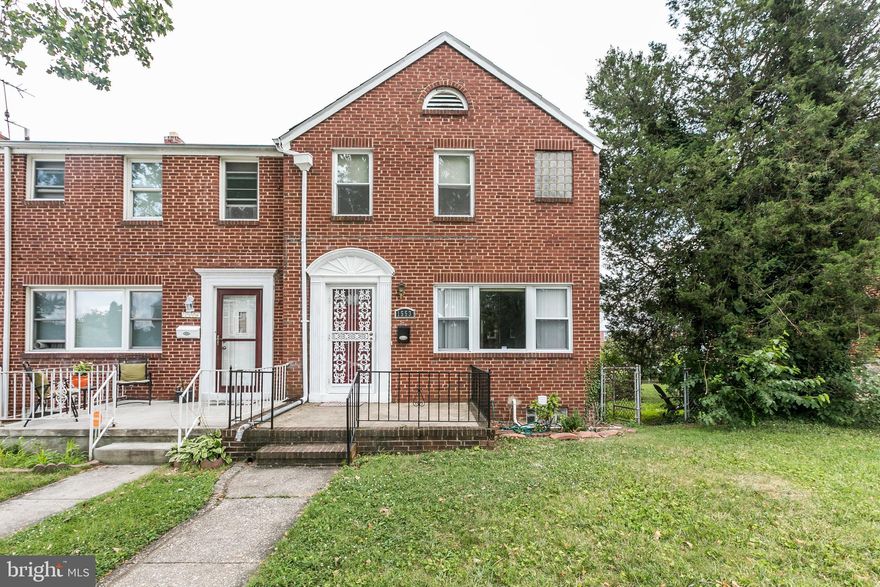 WIDE END OF GROUP ROWHOME WITH APPROXIMATELY 1,700 SQ. FT. OF LIVING SPACE!  Spacious living room w/ hardwood floors, separate dining room w/ chair rail, updated kitchen w/ ss appliances, upper level w/ 3 large bedrooms & 1 full bath w/ whirlpool tub, finished walk-out basement w/ family room or 4th bedroom and 2nd full bath, and large fenced yard.  Sold As-Is!