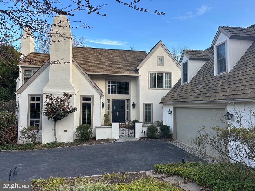 Set within the established Denbigh community in Wayne, 1244 Denbigh Lane presents a well-proportioned Brighton model offering approximately 4,900 square feet, with four bedrooms and 3.5 baths. The community is known for its preserved open space, walking paths, and natural surroundings, along with convenient access to major routes, shopping, and dining in the 19087 area.
A two-story foyer introduces the interior, leading to a private office with a fireplace and custom built-ins, as well as a formal living room with a gas fireplace. The living room flows into the dining room, creating a connected setting well suited for both everyday living and entertaining. Doors from the dining room open to a bluestone patio featuring a koi pond and wooded views, offering a thoughtfully designed outdoor space with a sense of privacy.
The kitchen is centrally positioned between the dining room and family room and includes an island, gas cook top, double ovens, pantry closet, and an eat-in area, along with a nearby bar area that supports gatherings of all sizes. The family room features a wood-burning fireplace and provides a comfortable space with views of the surrounding landscape and direct access to the patio.
Hardwood flooring extends throughout the main level, which also includes a spacious powder room, a generously sized laundry room, and a flexible mudroom or office area connecting the heated two-car garage to a separate fourth bedroom suite above.
The second floor includes three bedrooms, highlighted by the main suite with a gas fireplace, dual vanities, soaking tub, separate shower, and individual walk-in closets. The additional suite above the garage offers a flexible layout suitable for a variety of uses and includes its own HVAC system and water heater.
The finished lower level expands the living space and features a wine cellar, cedar closet, additional storage, a secondary laundry area, and a workbench. The house also has a central vac system.
A recently completed full stucco exterior renovation enhances the home’s overall condition and long-term maintenance profile. Professional pictures expected to be on MLS 3/27.  
Schedule a tour today!