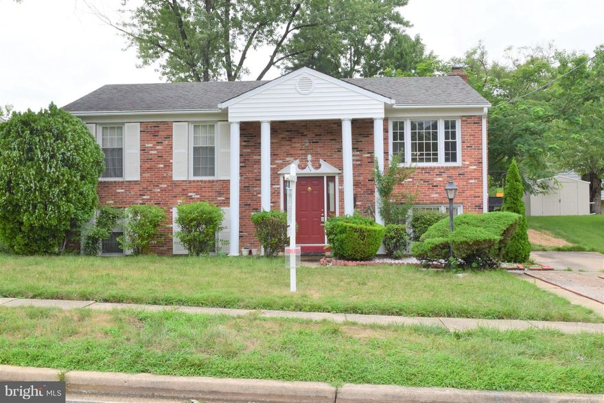 Lovely brick front split foyer colonial with 5 bedrooms & 2 Full baths.Wood floors in bedrooms, Mstr Bedroom with walk in closet. Spacious eat in kitchen with huge island. Large backyard with shed. Basement layout great for entertaining, Oversize laundry/storage room, and full bath. Home is close to 495, shopping, and recreation park. This wont last long.