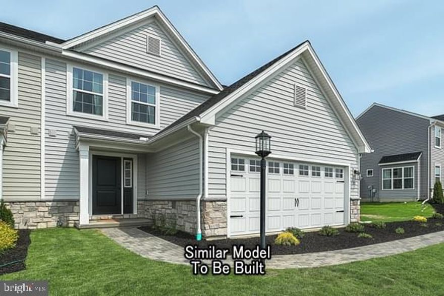Absolutely stunning new build home in the Cumberland Preserve community located in CV Schools and Middlesex Township! This Primrose floor plan is a 2-story home that takes duplex living to the next level with its lofty footprint, boasting 2,125 sq. ft. of living space, and the convenience of 1st FLOOR LIVING!  The family room includes a cozy gas fireplace and the dining room has an added bay window extension! The owner's suite features an upgraded raised height tray ceiling creating an open airy feeling to the room with an owner's bathroom that checks off all the YES PLEASE features including a double bowl vanity. 
Two additional bedrooms, both outfitted with large walk-in closets of their own are found on the second floor, PLUS, a loft for additional living space!   This home includes a deck and backs up to a mature wooded tree line that offers a private escape and a beautiful view to enjoy your outdoor space.  Cumberland Preserve is a  unique community set among 70 acres of open space that includes a walking path, playground, open fields, and shaded pavilion areas for the best in community living.