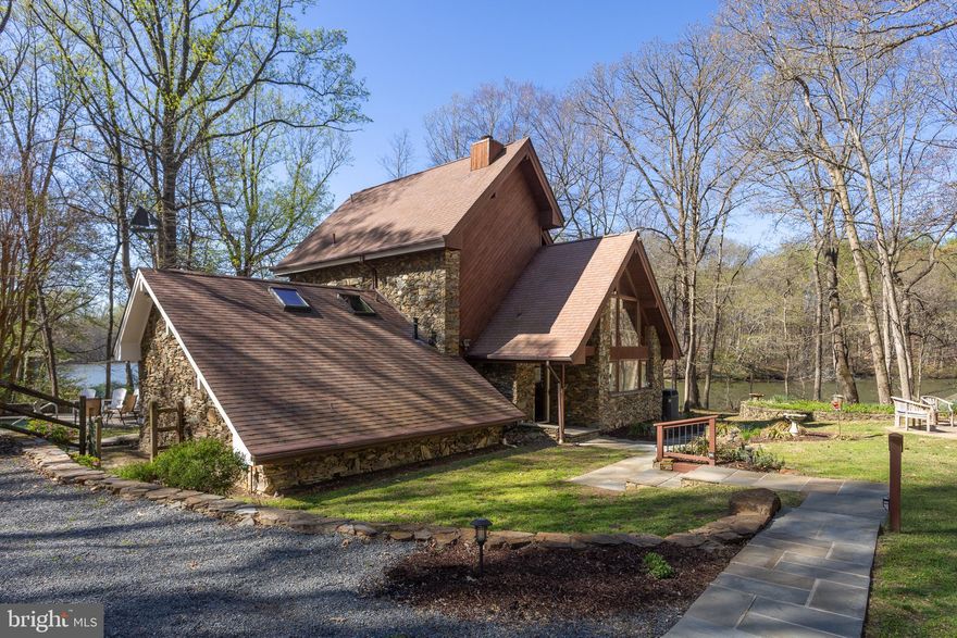 Do you crave peace, privacy and waterfront? Escape to your own slice of paradise in this meticulously maintained 3-bedroom, 2-bathroom estate, where luxury meets sustainability. Nestled on a beautifully wooded and private 1.58 acre lot, this home is a true sanctuary for nature lovers and water enthusiasts alike. The interior features a thoughtful layout designed for comfort, but the true magic lies in the resort-style amenities. Unwind after a long day in your private sauna or soak in the hot tub while overlooking your lush surroundings. Summer days are best spent lounging by the sparkling inground pool or enjoying the breeze from the screened porch and expansive deck. Winter evenings snuggle up in front of the wood burning fireplace inserts in the living room and the den, or in front of the fire in your bedroom. Unwind by walking the meditation labyrinth. Situated on the upper portion of Mill Creek, this property boasts a private pier, providing a gateway to the Sassafras River for boating, fishing, or simply enjoying the tranquil water views. The detached 2-car garage is more than just storage; it features a finished loft with full bathroom perfect for a home office, guest suite, or creative studio. The fully owned solar panel system heats the inground swimming pool. Thirteen miles from tax-free shopping in Middletown, DE. Whether you’re looking for a full-time residence or a weekend getaway, this property offers an unparalleled blend of peace, privacy, and outdoor adventure.